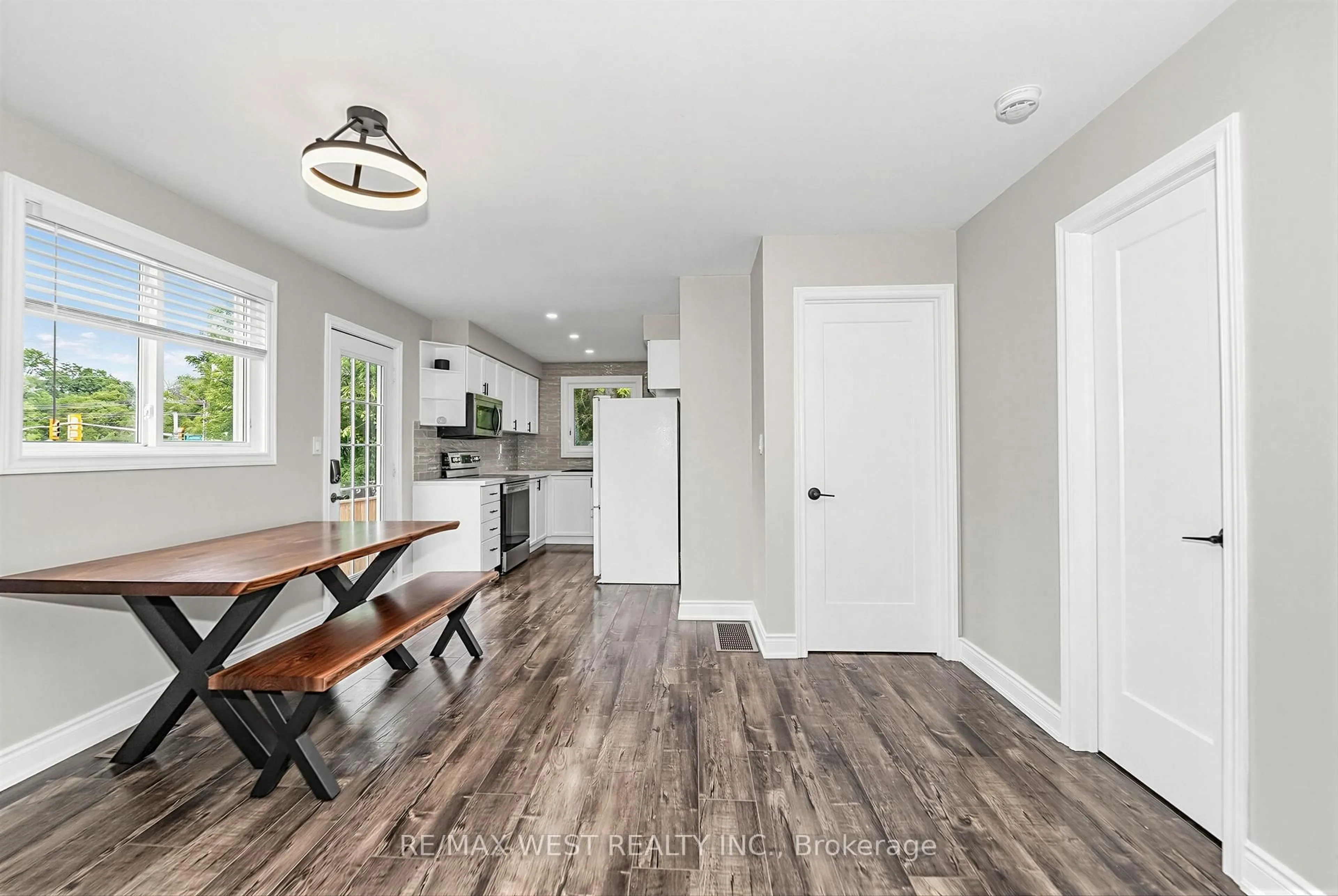 Open concept kitchen, wood/laminate floor for 641 Deauville Crt, Oshawa Ontario L1K 1R1