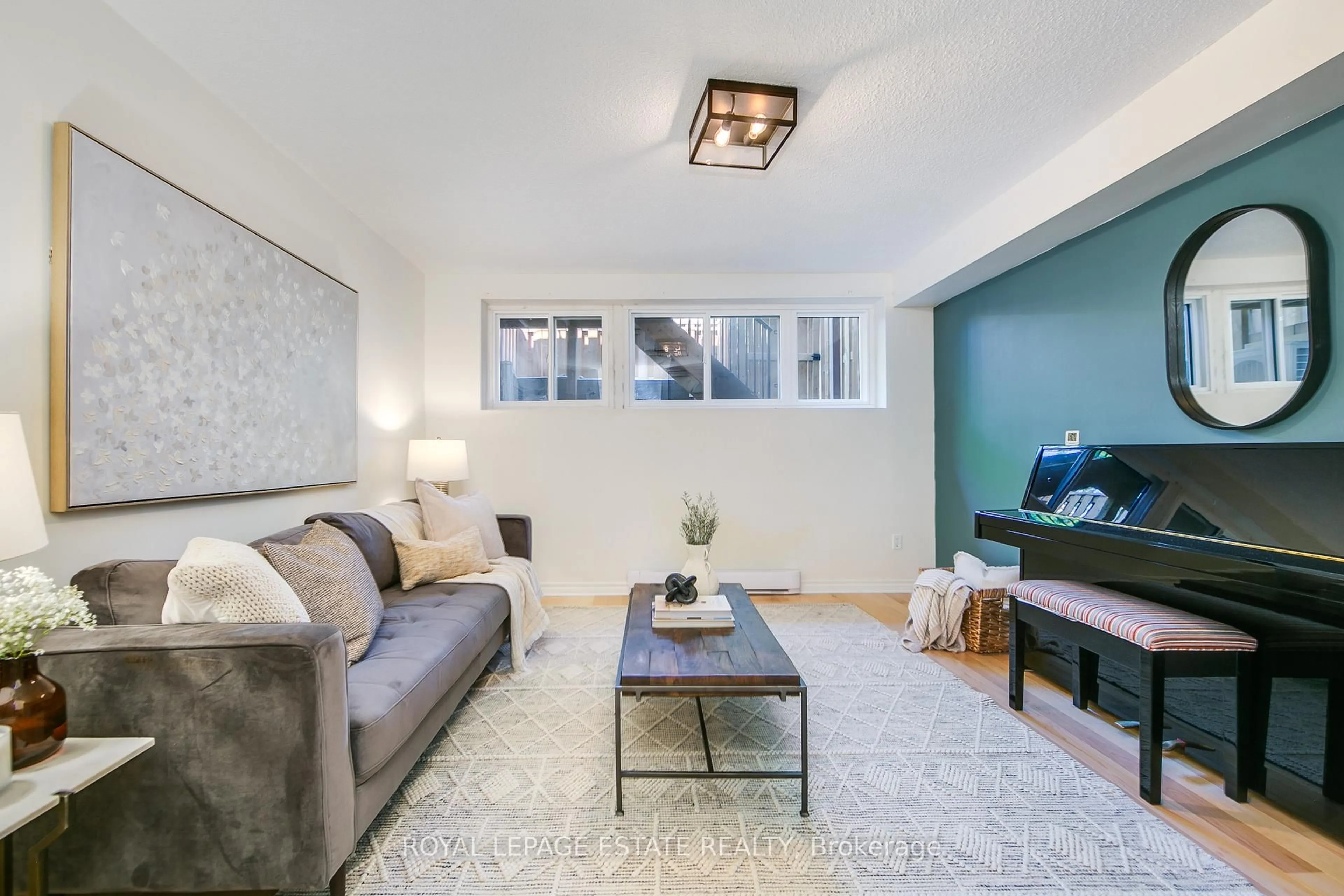 Living room with furniture, unknown for 1209 Queen St #72, Toronto Ontario M4M 3H4