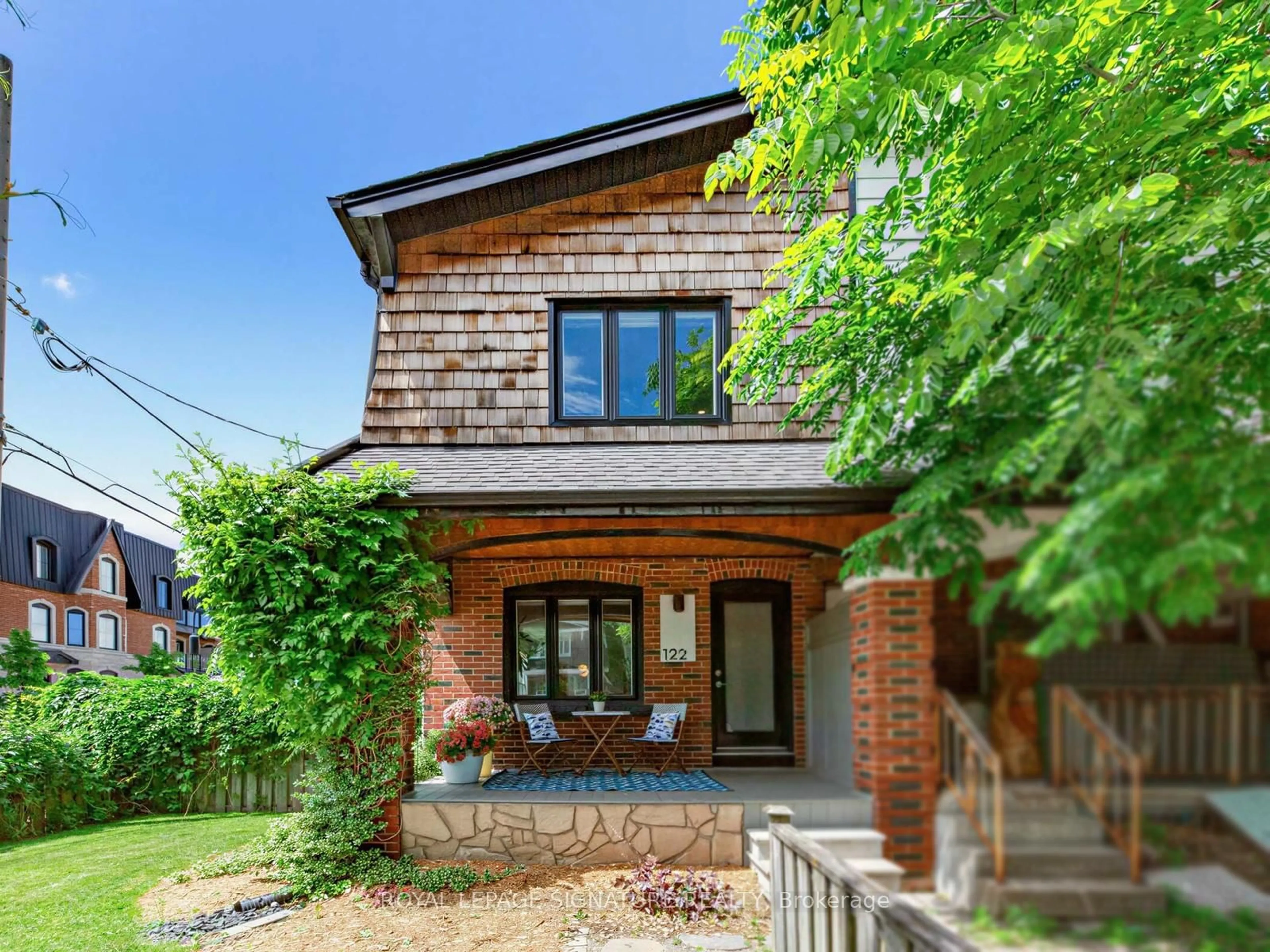 Home with brick exterior material, street for 122 Donlands Ave, Toronto Ontario M4J 3P6
