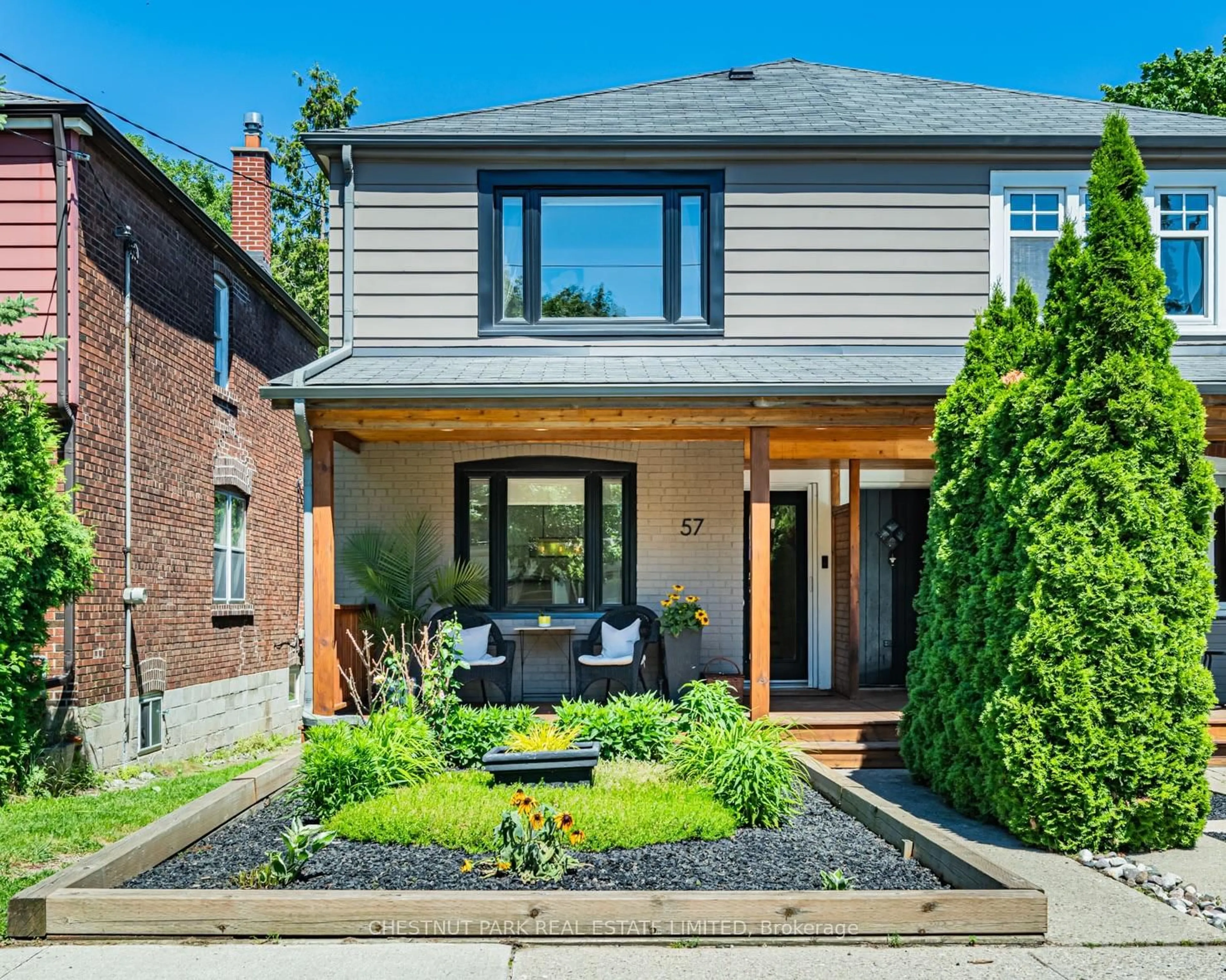 Home with brick exterior material, street for 57 Billings Ave, Toronto Ontario M4L 2S3