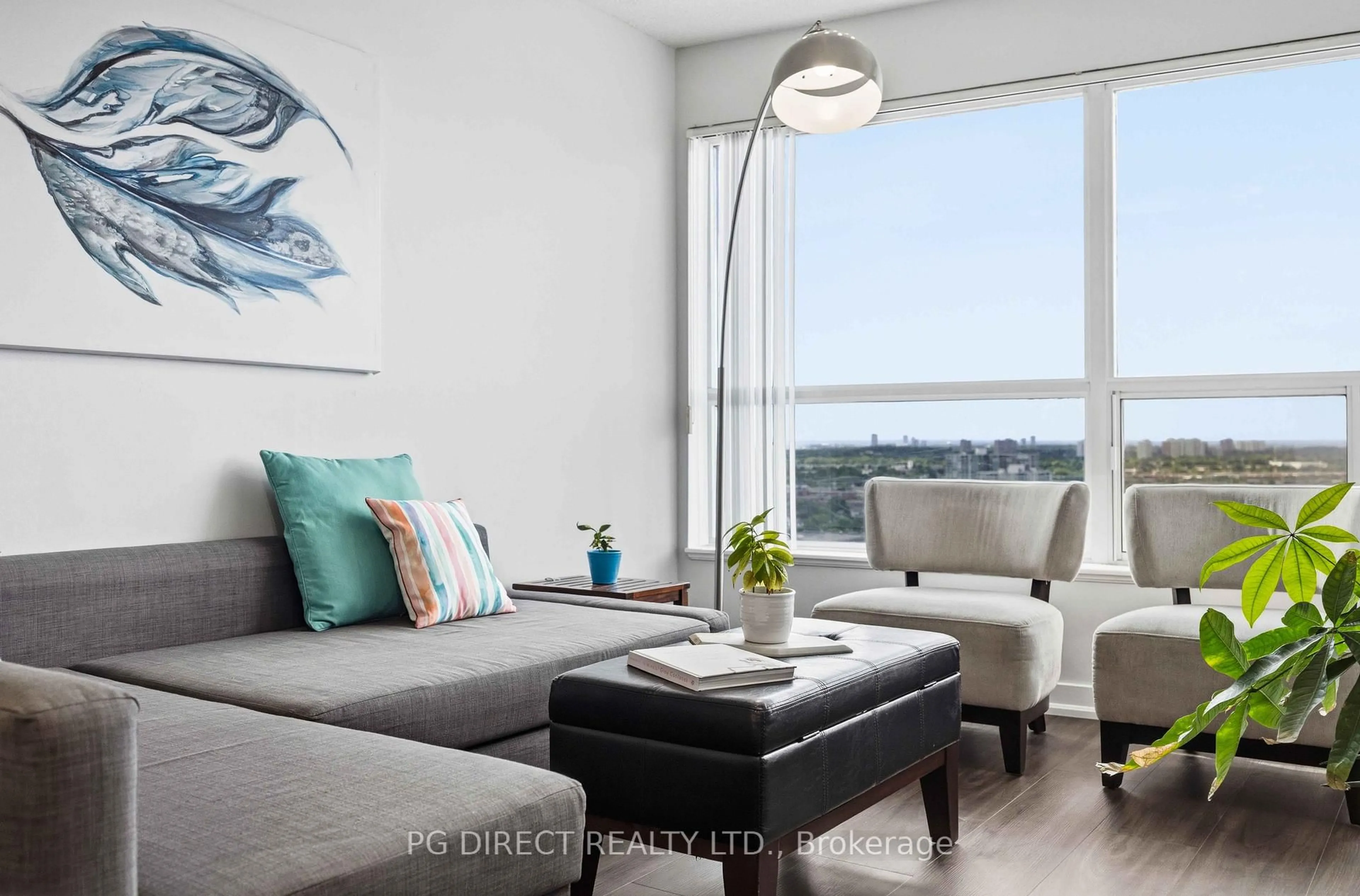 Living room with furniture, wood/laminate floor for 38 Lee Centre Dr #2716, Toronto Ontario M1H 3J7