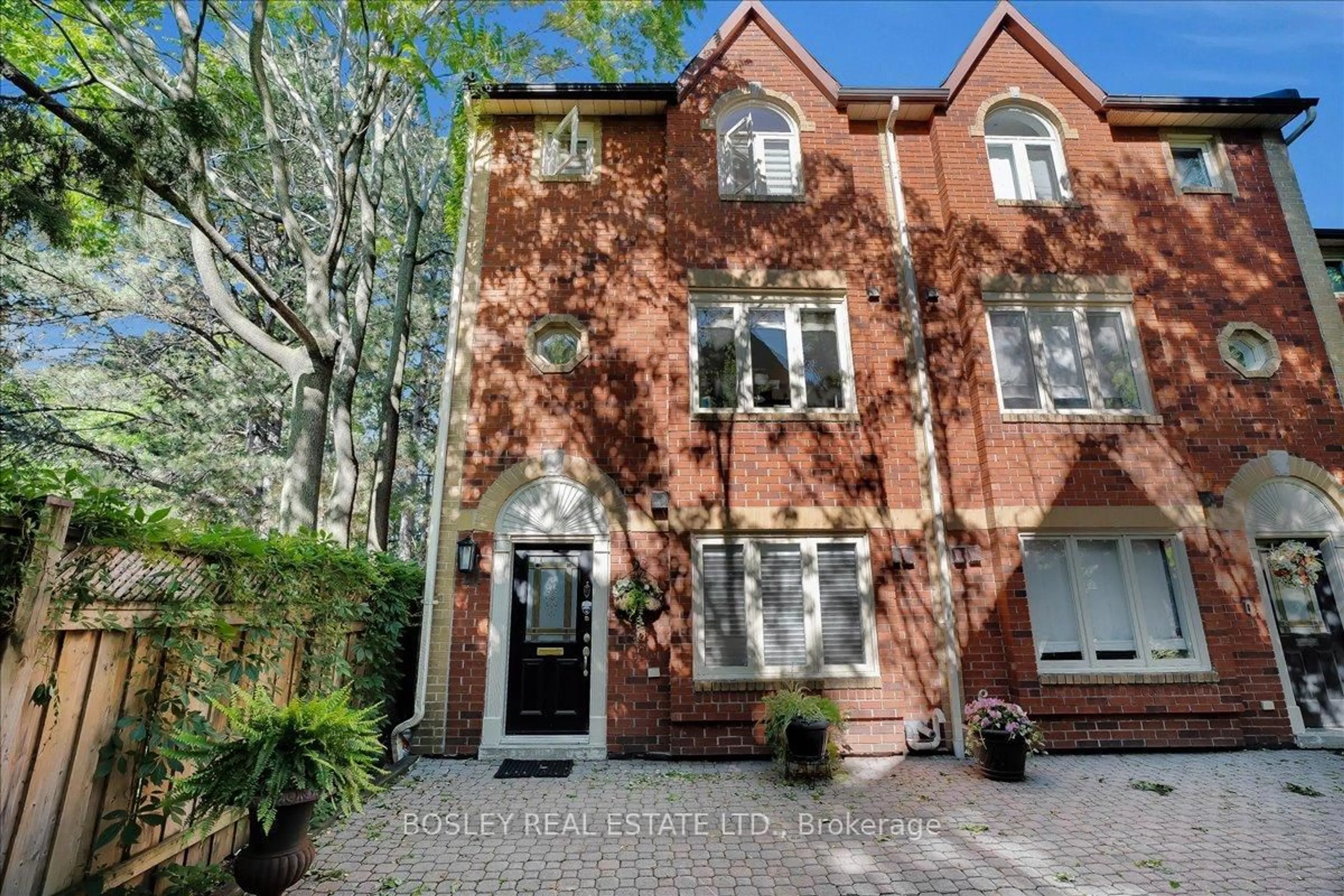 Home with brick exterior material, street for 18 Doncrest Rd ##11, Toronto Ontario M4K 1R8