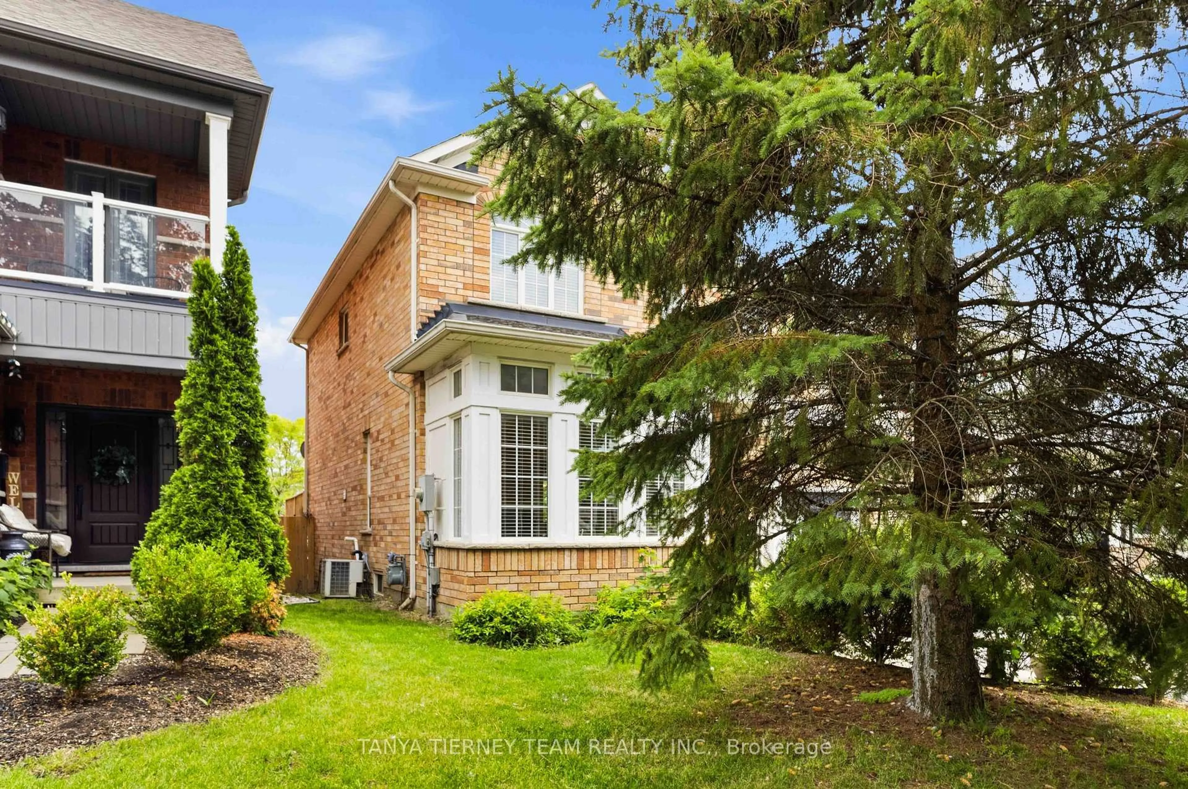 Home with brick exterior material, street for 23 Cody Ave, Whitby Ontario L1M 1K7