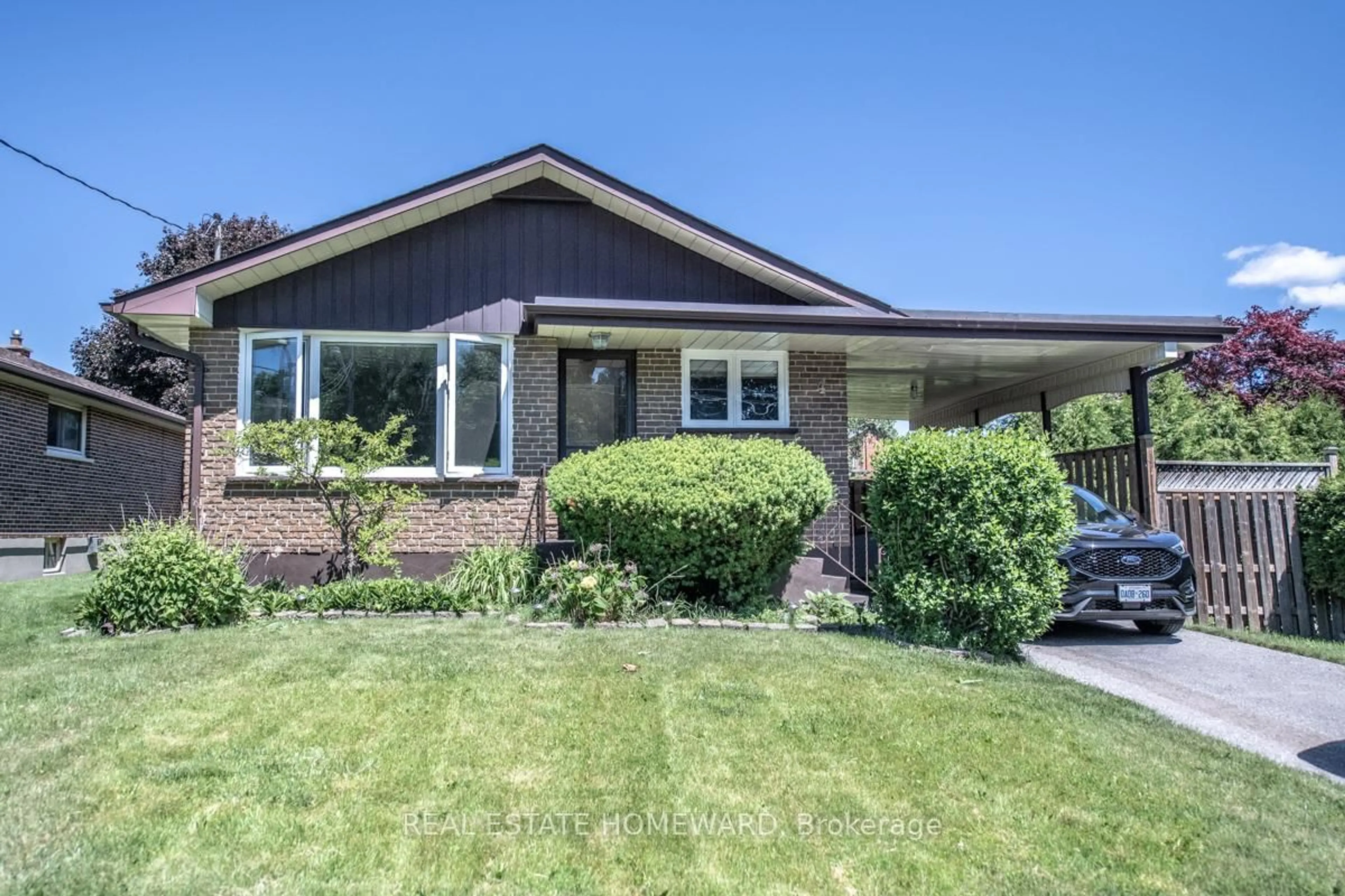 Home with brick exterior material, street for 4 Sunicrest Blvd, Clarington Ontario L1C 2G7