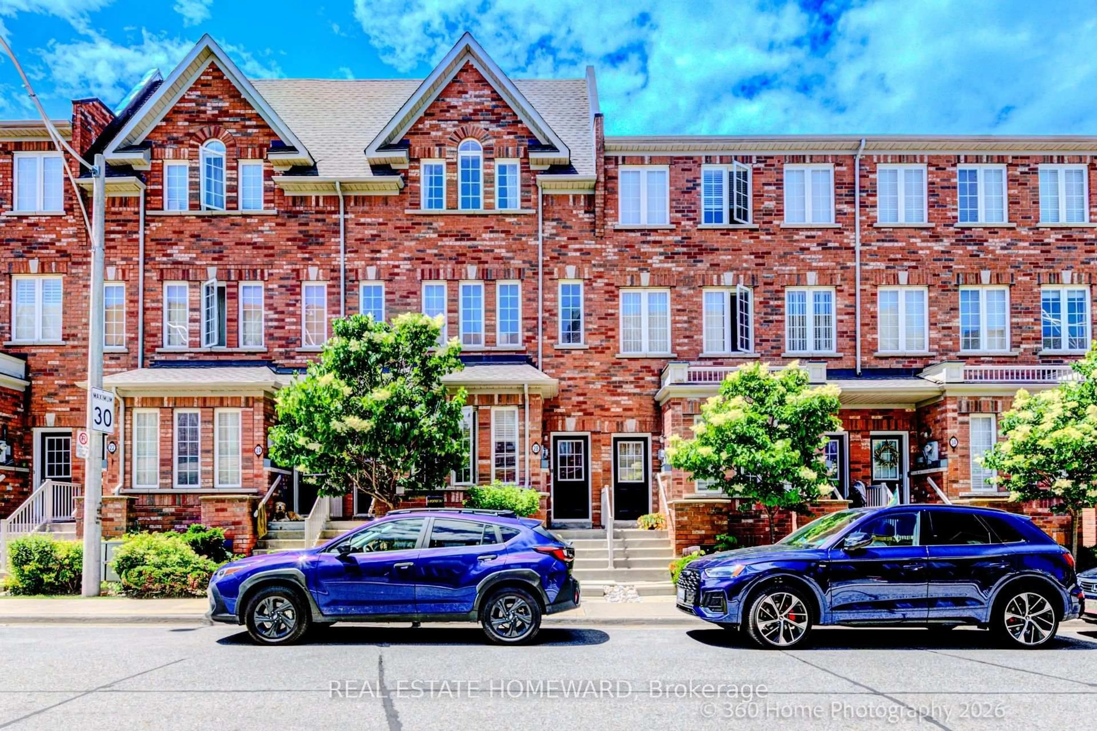 Home with brick exterior material, street for 28 Carnahan Terr, Toronto Ontario M4E 0B2