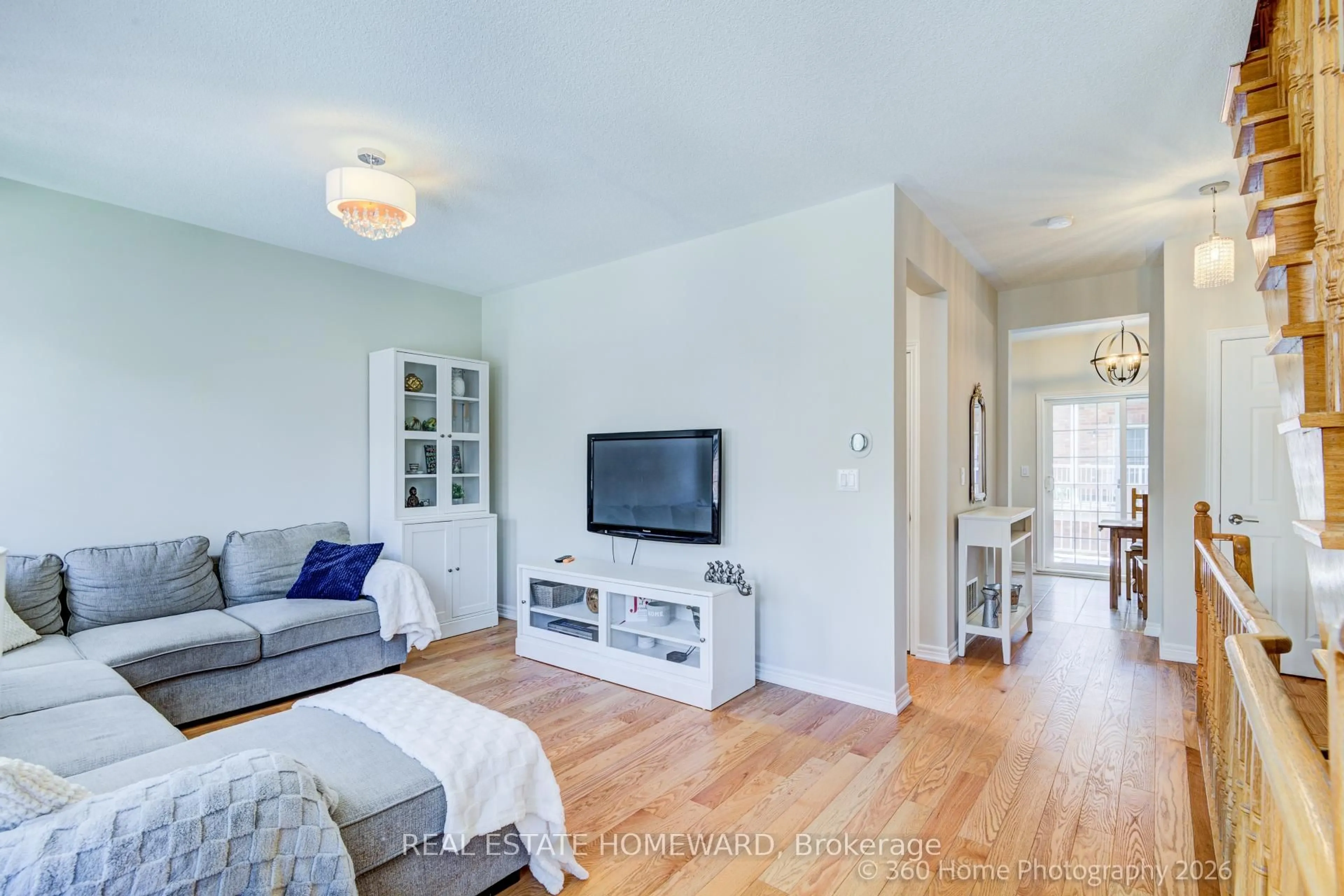 Living room with furniture, unknown for 28 Carnahan Terr, Toronto Ontario M4E 0B2