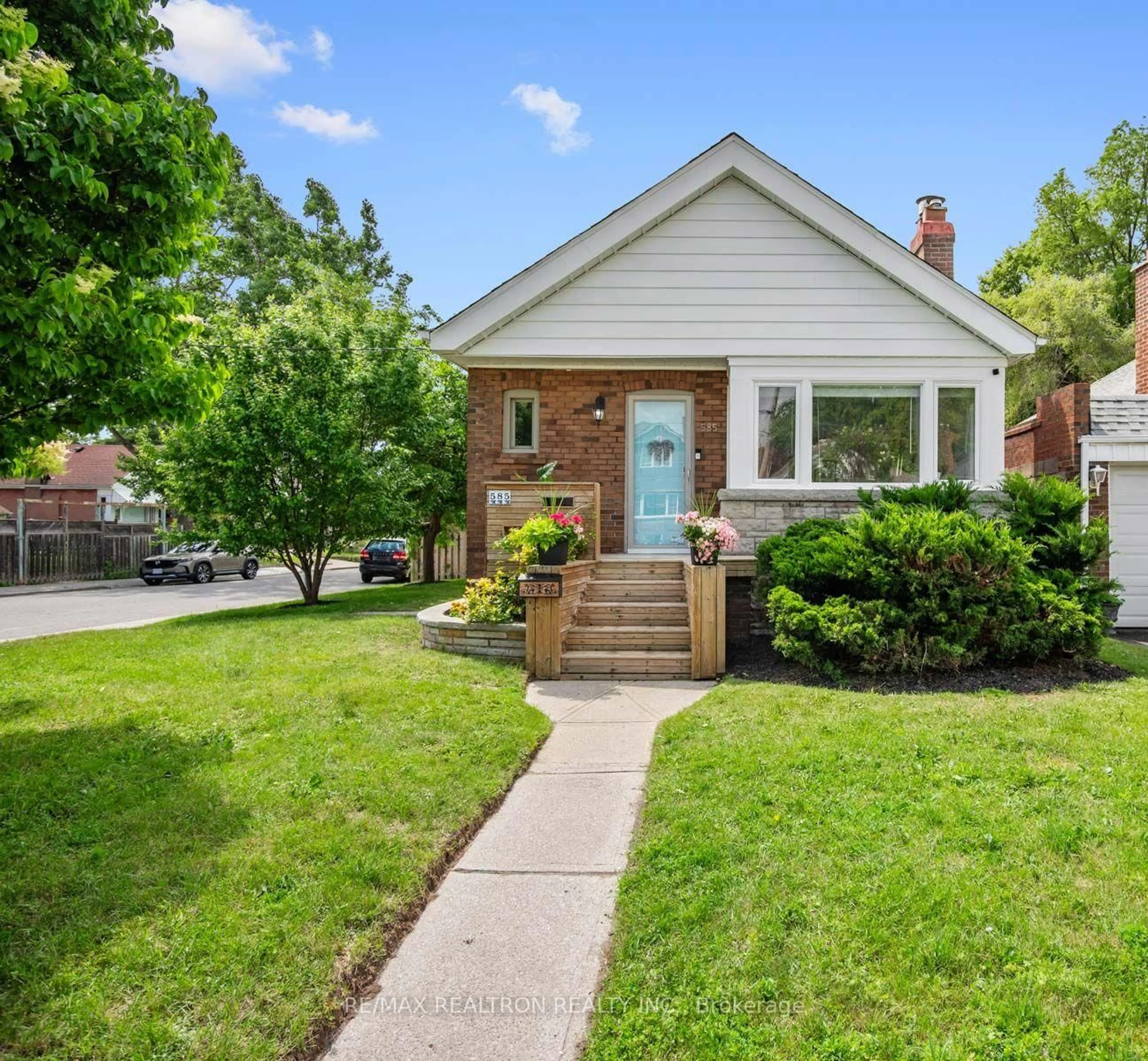 Home with brick exterior material, street for 585 O'Connor Dr, Toronto Ontario M4C 2Z9