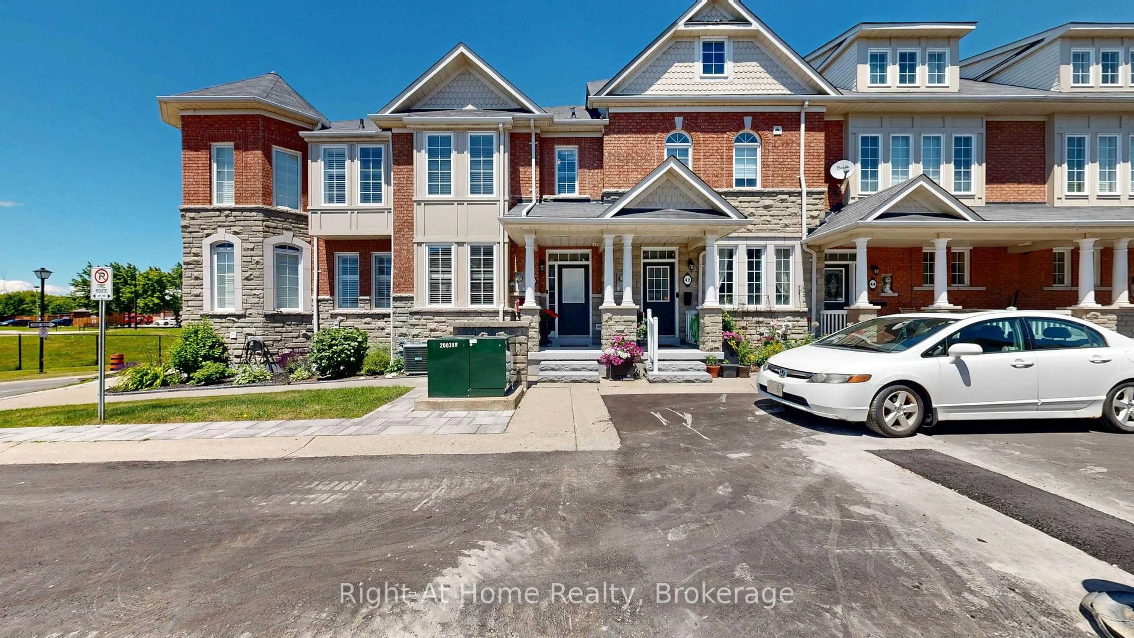 Home with brick exterior material, street for 40 Torr Lane, Ajax Ontario L1S 7M9