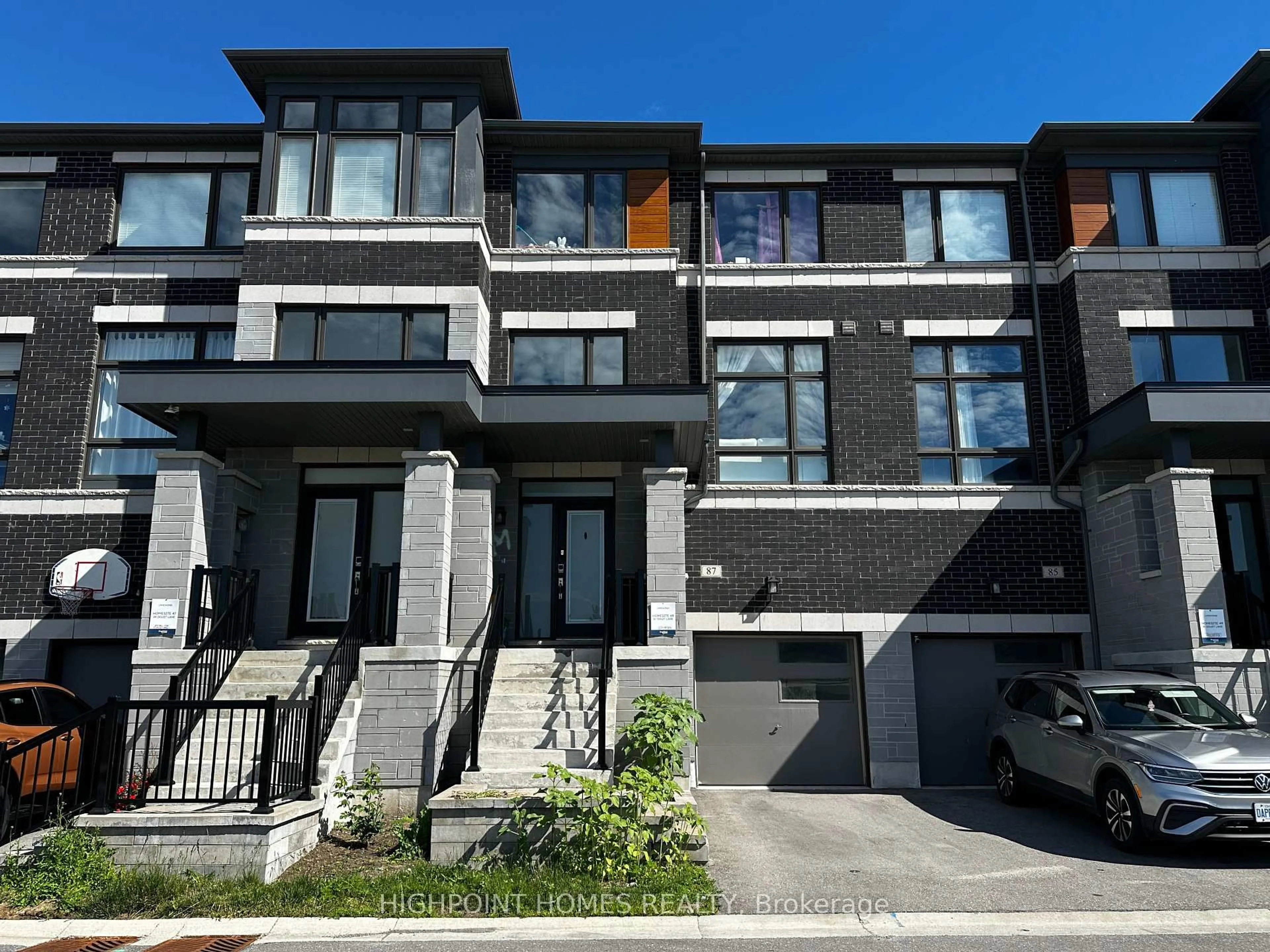 Home with brick exterior material, street for 87 Douet Lane, Ajax Ontario L1Z 0V4