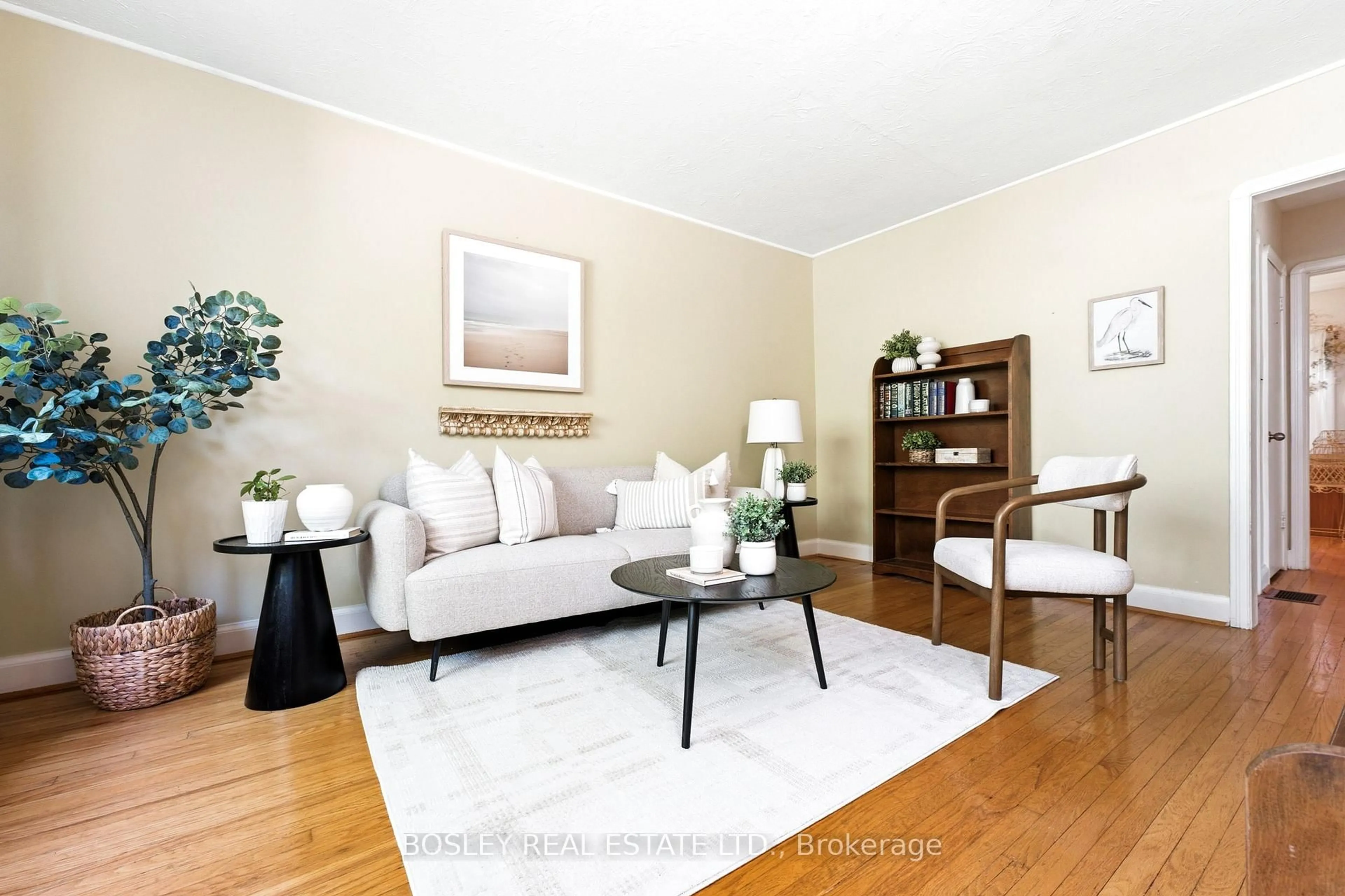 Living room with furniture, wood/laminate floor for 121 Presley Ave, Toronto Ontario M1L 3P9