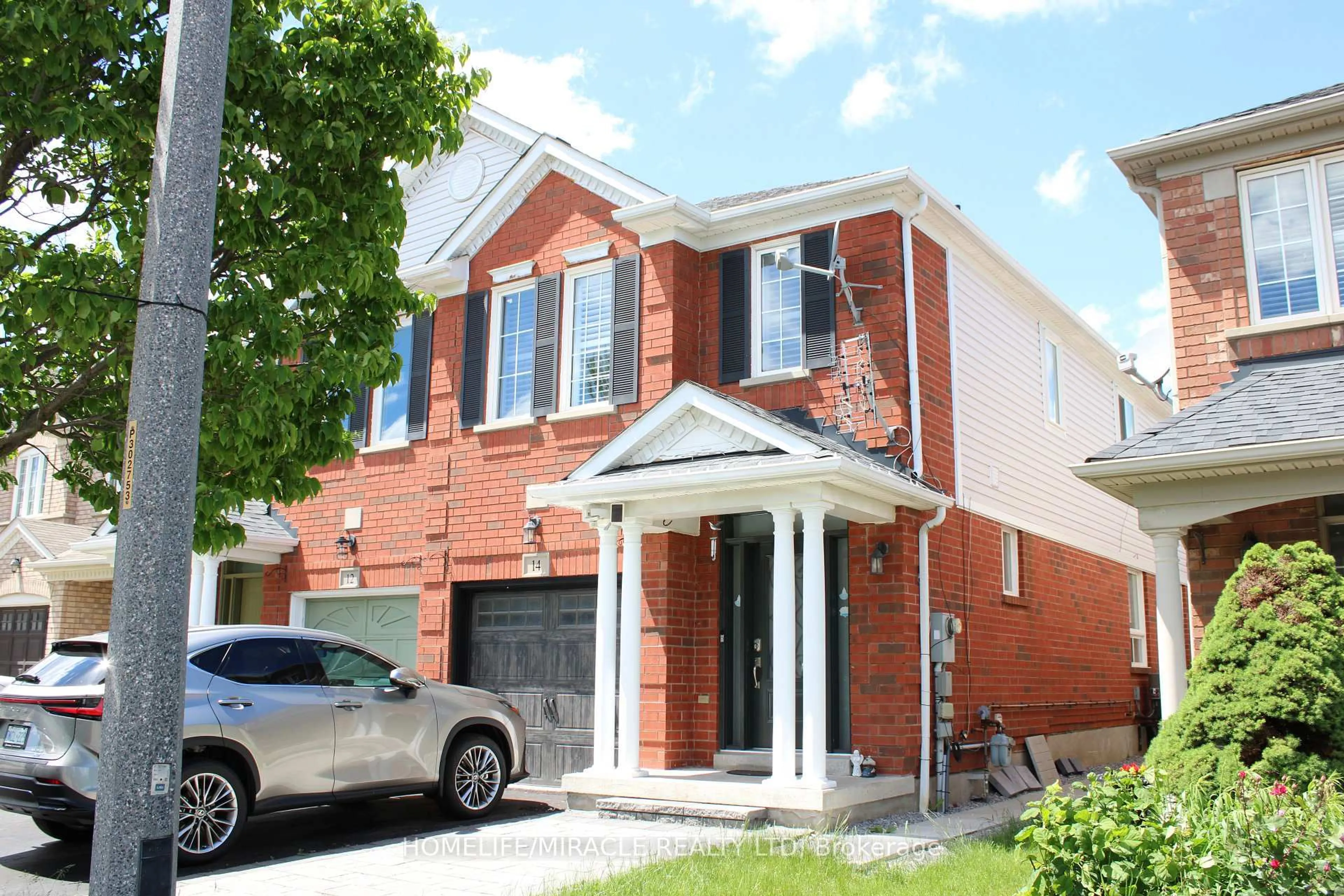 Home with brick exterior material, street for 14 Unsworth Cres, Ajax Ontario L1T 4Y2