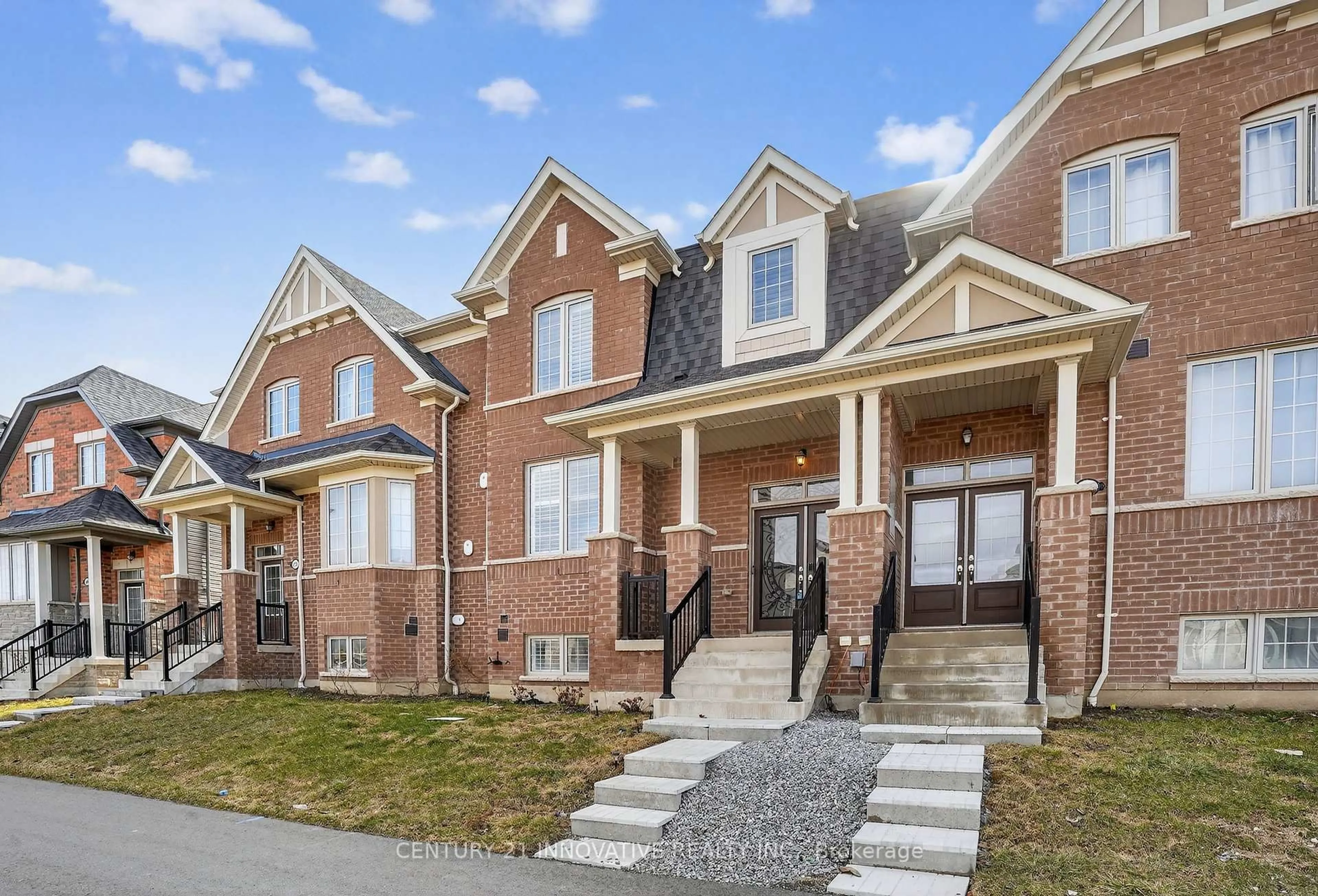 Home with brick exterior material, street for 310 Coronation Rd, Whitby Ontario L1P 0K8