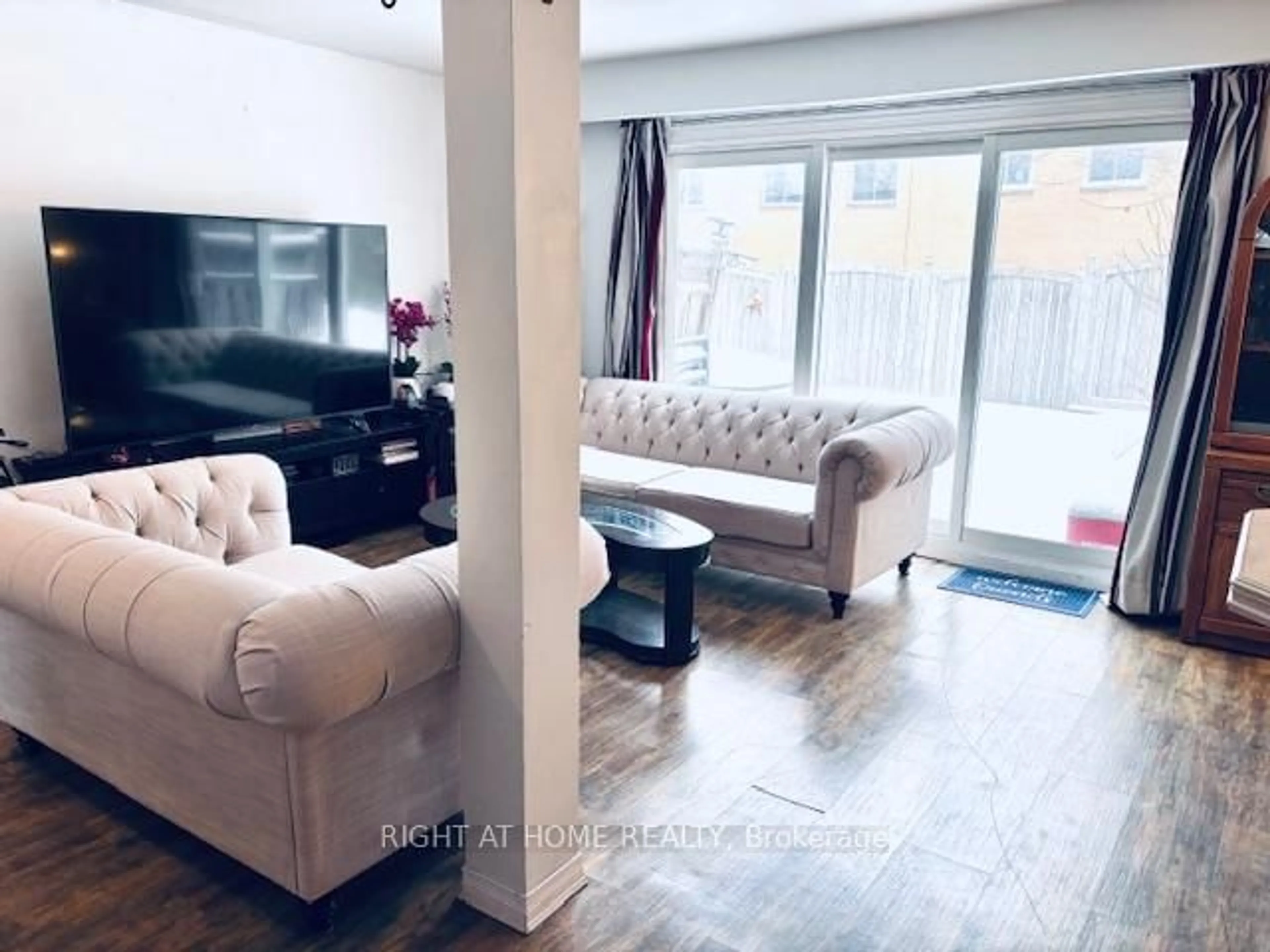 Living room with furniture, wood/laminate floor for 925 Bayly St #7, Pickering Ontario L1W 1L4