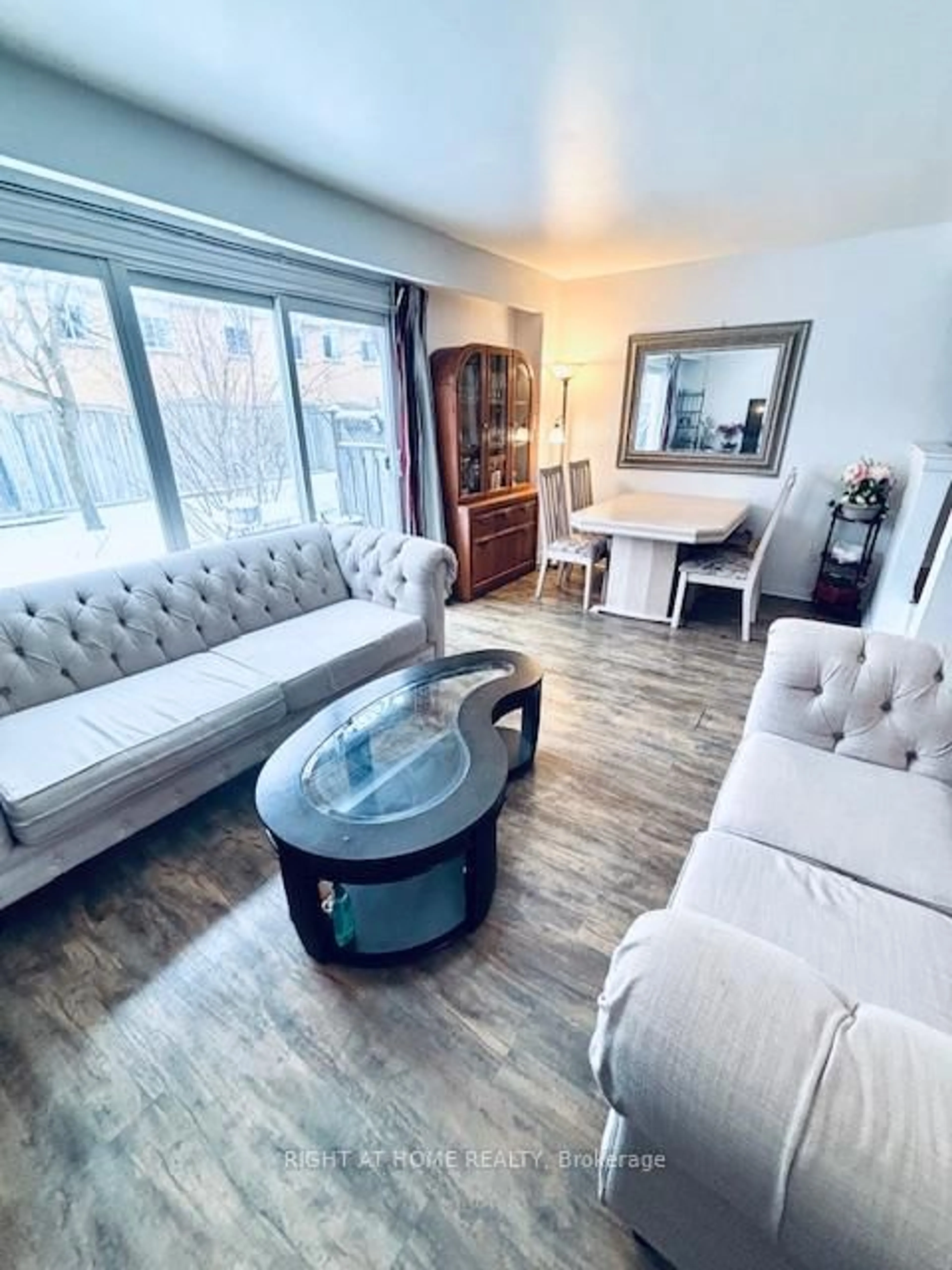 Living room with furniture, wood/laminate floor for 925 Bayly St #7, Pickering Ontario L1W 1L4
