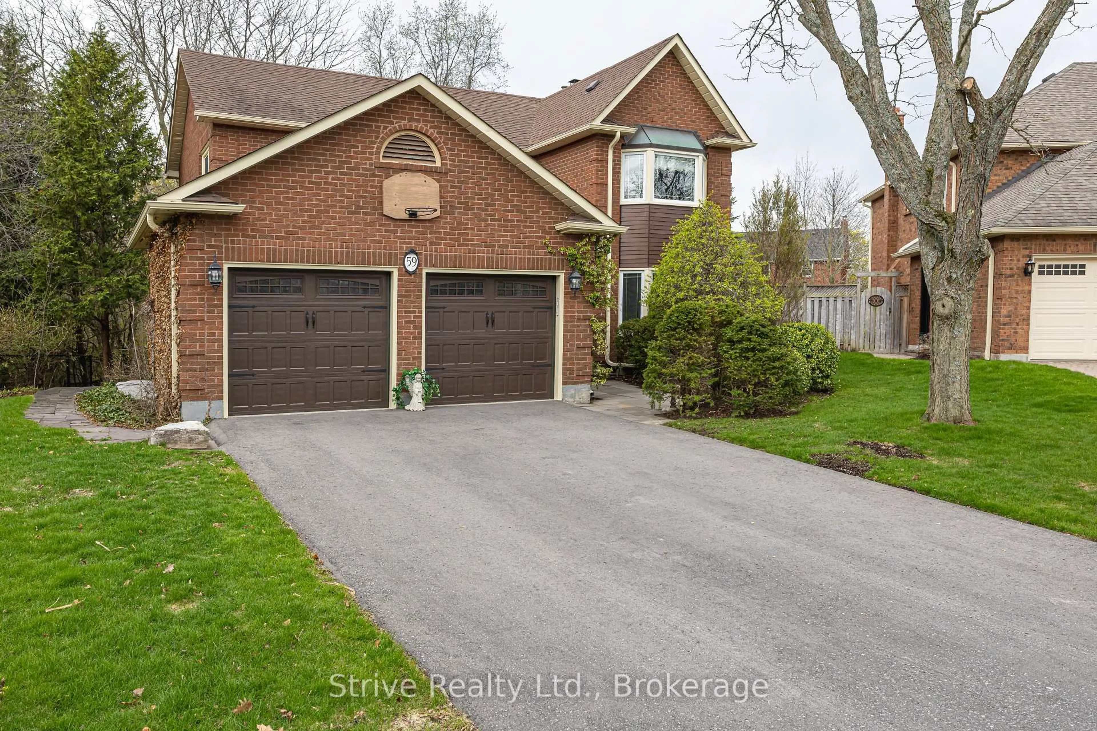 Home with brick exterior material, street for 59 Blackcreek Tr, Clarington Ontario L1E 1J9