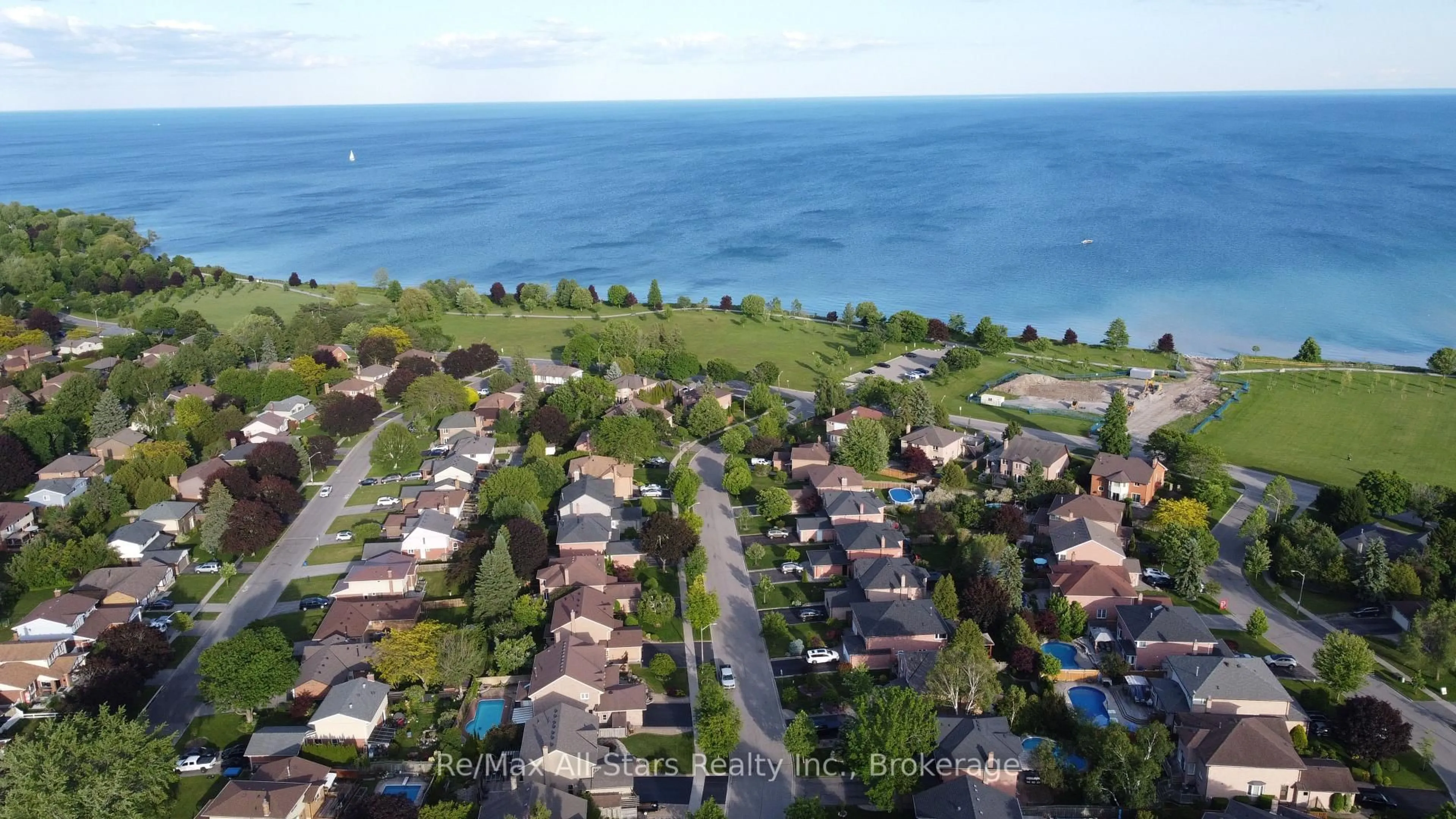 A pic from outside/outdoor area/front of a property/back of a property/a pic from drone, water/lake/river/ocean view for 20 Love Cres, Ajax Ontario L1S 4T1