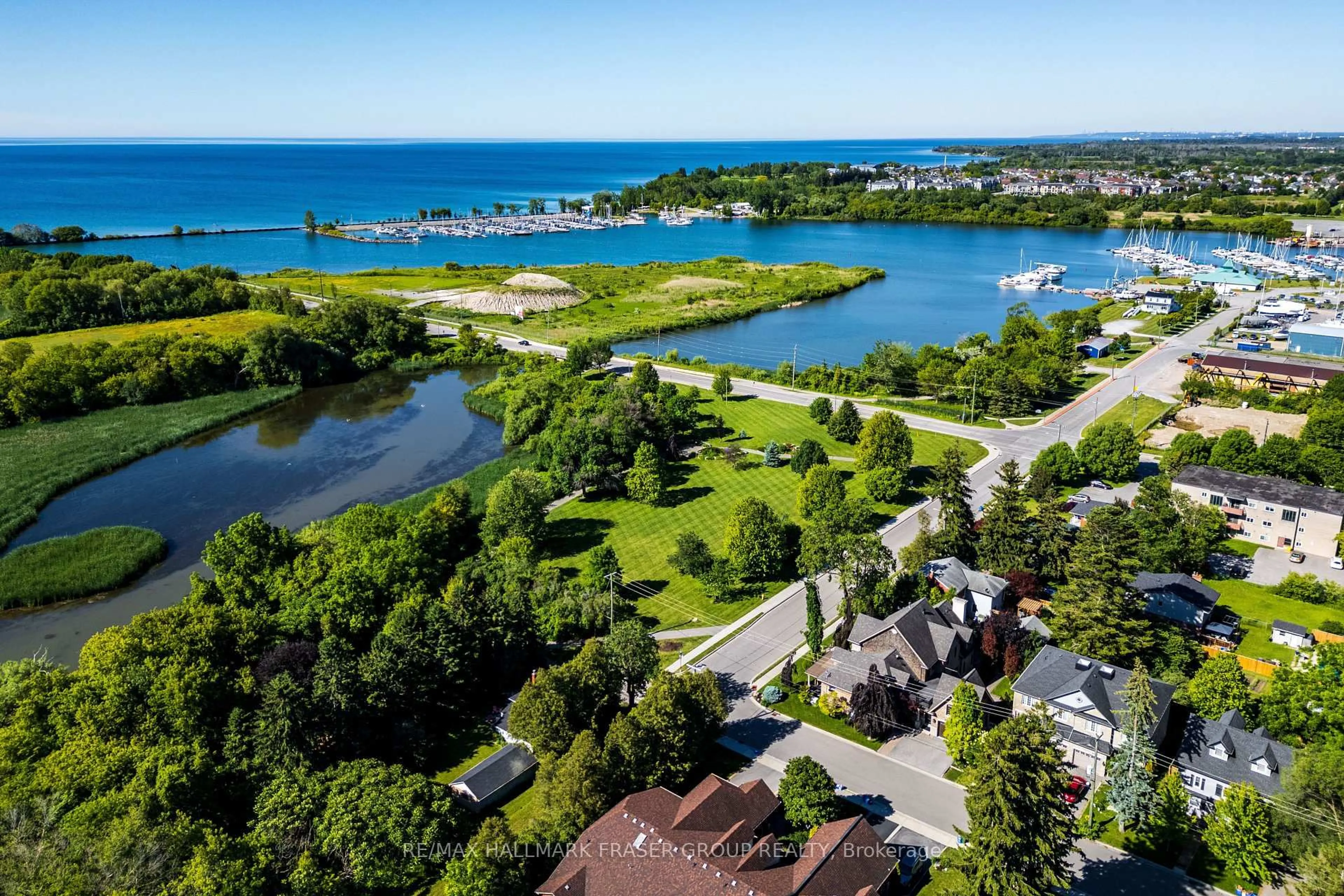 A pic from outside/outdoor area/front of a property/back of a property/a pic from drone, water/lake/river/ocean view for 134 Front St, Whitby Ontario L1N 1A1