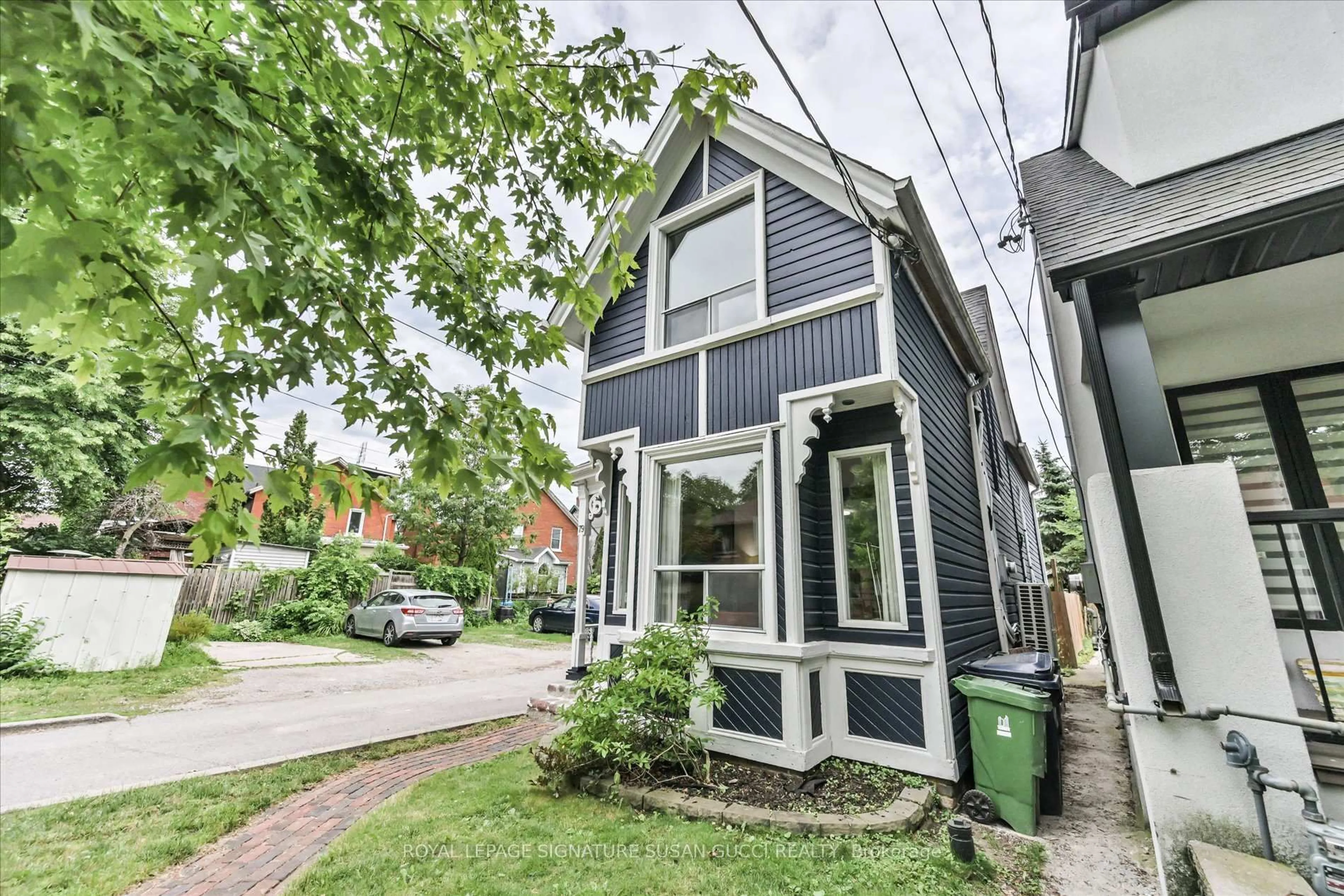 Home with brick exterior material, street for 79 Balfour Ave, Toronto Ontario M4C 1T4