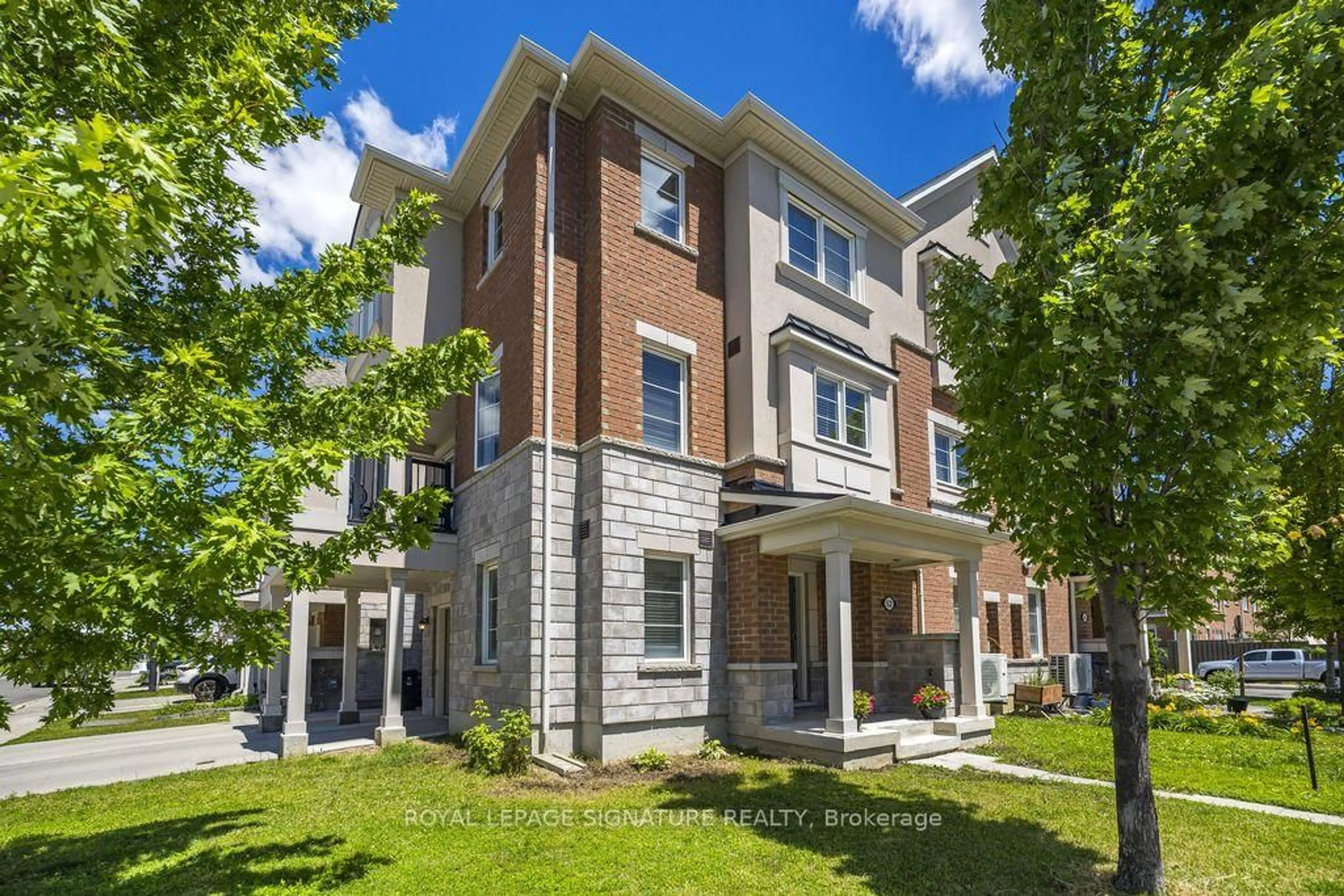Home with brick exterior material, building for 52 Deans Dr, Toronto Ontario M1L 0J4