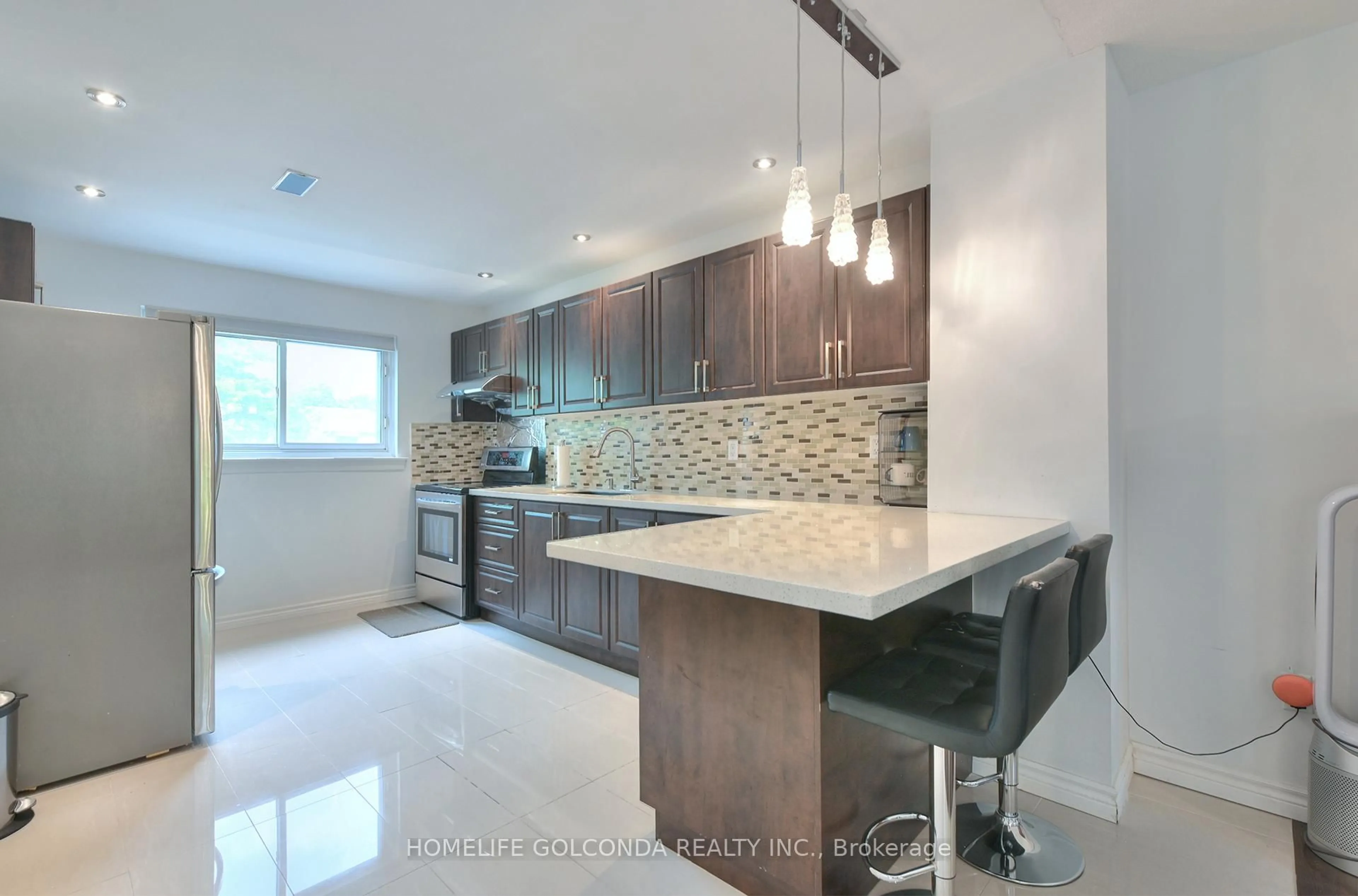 Open concept kitchen, ceramic/tile floor for 8 Glen Springs Dr, Toronto Ontario M1W 1X8