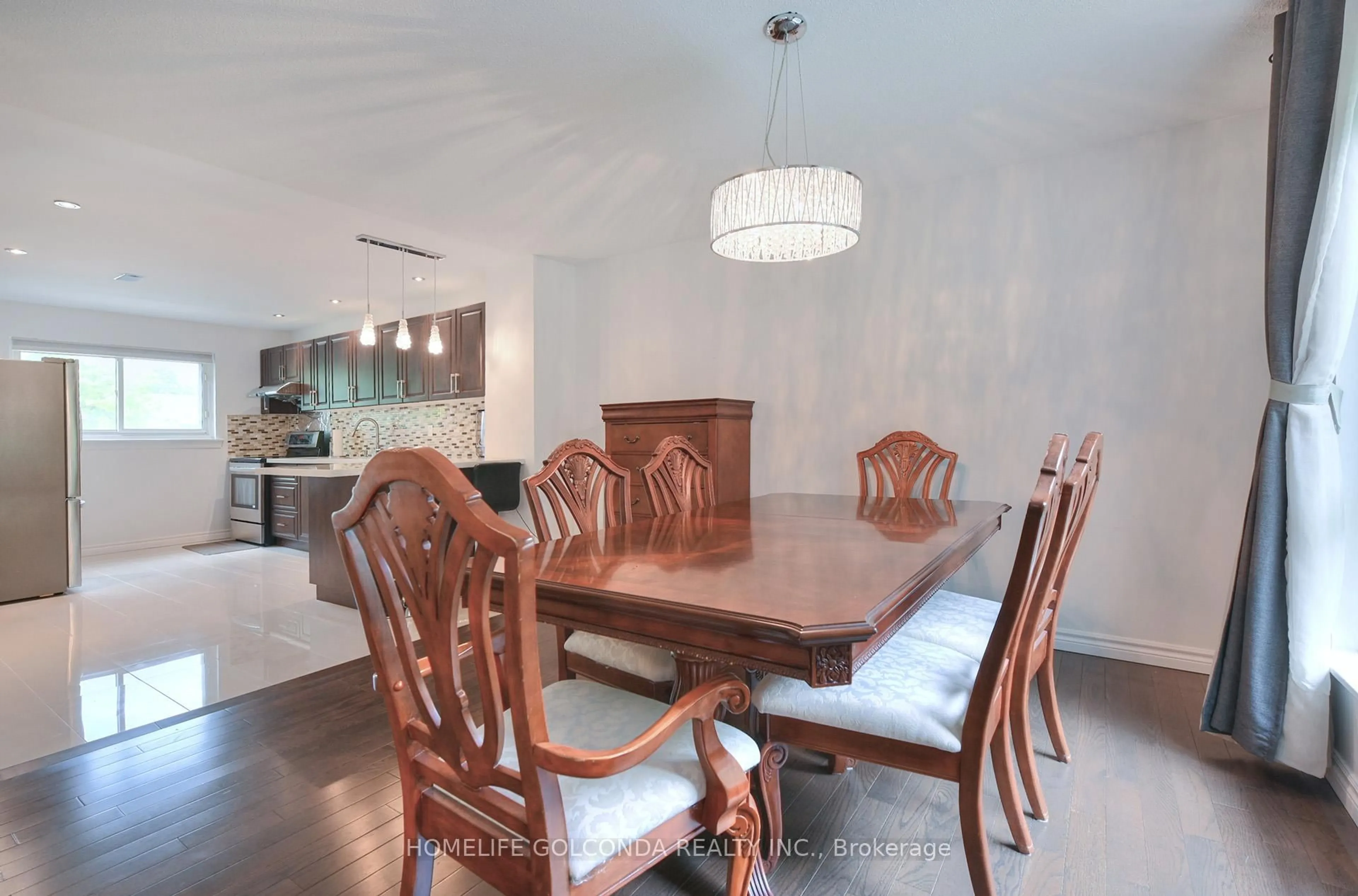 Dining room, wood/laminate floor for 8 Glen Springs Dr, Toronto Ontario M1W 1X8