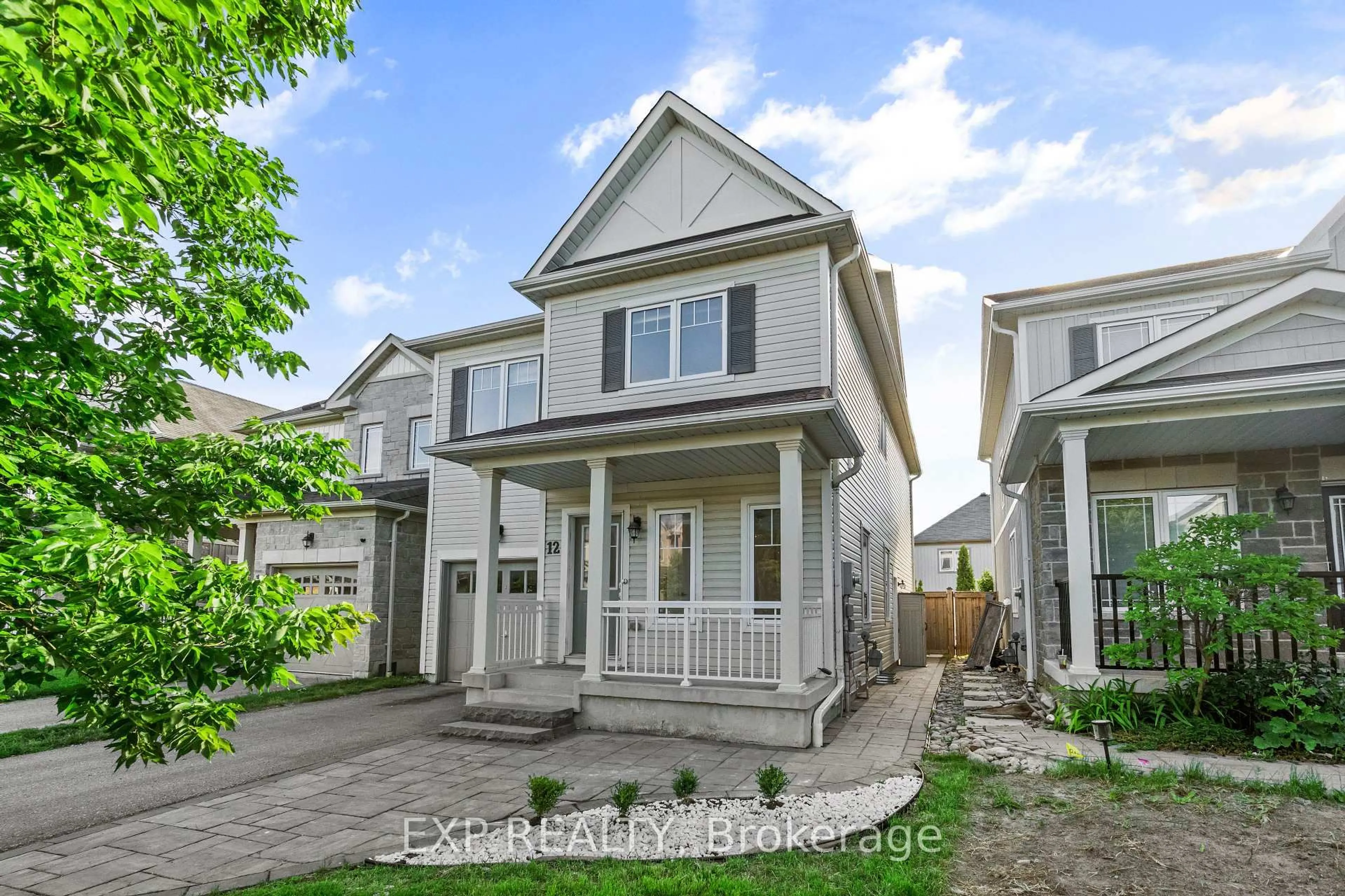 Home with vinyl exterior material, street for 12 Mantz Cres, Whitby Ontario L1R 0L3