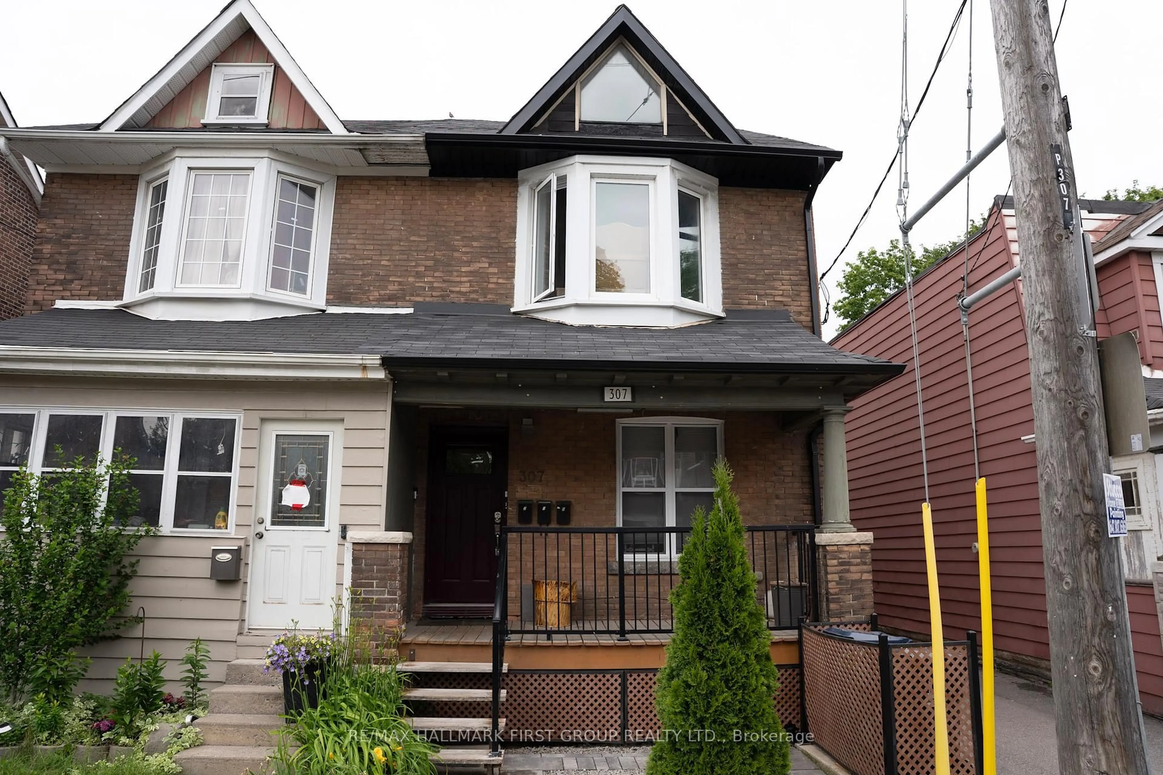 Home with brick exterior material, street for 307 Greenwood Ave, Toronto Ontario M4L 2R6