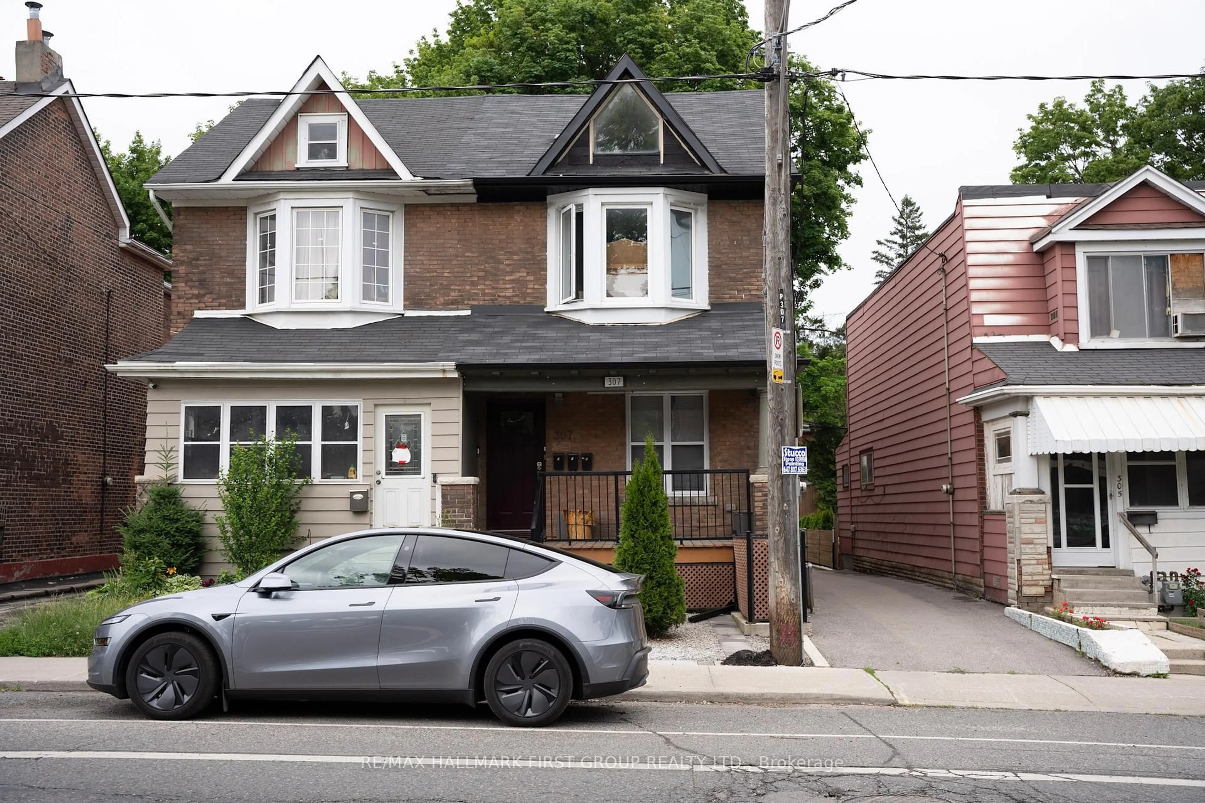 Home with brick exterior material, street for 307 Greenwood Ave, Toronto Ontario M4L 2R6