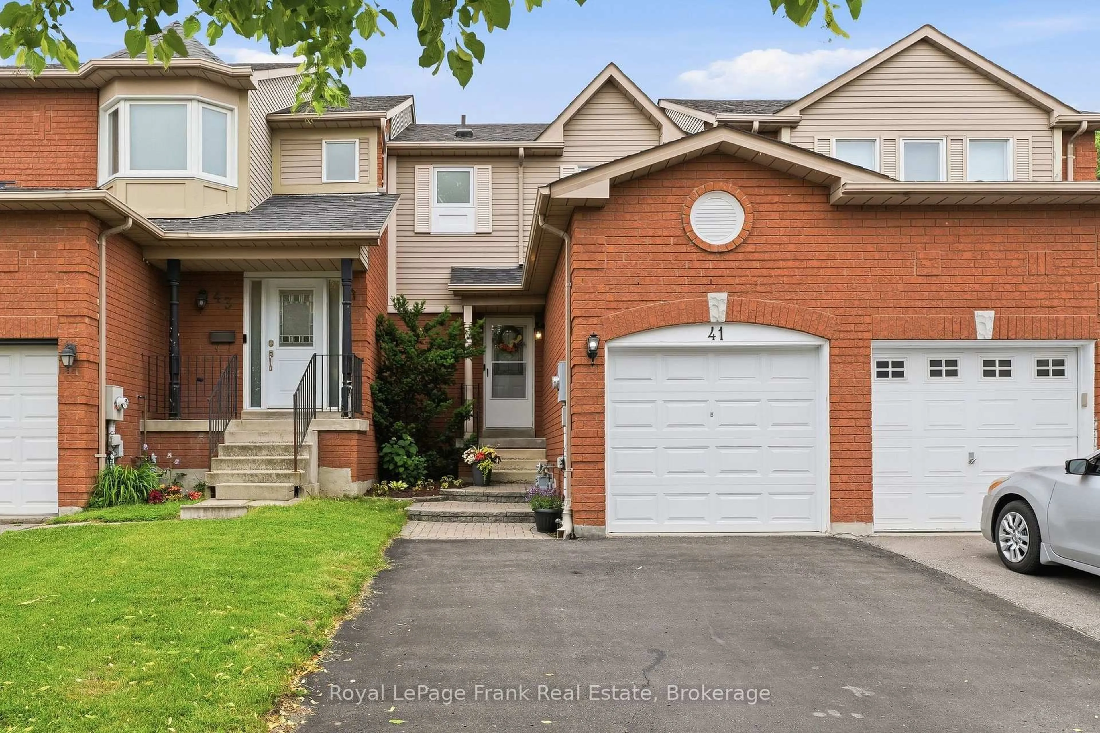 Home with brick exterior material, street for 41 Landerville Lane, Clarington Ontario L1C 4W8