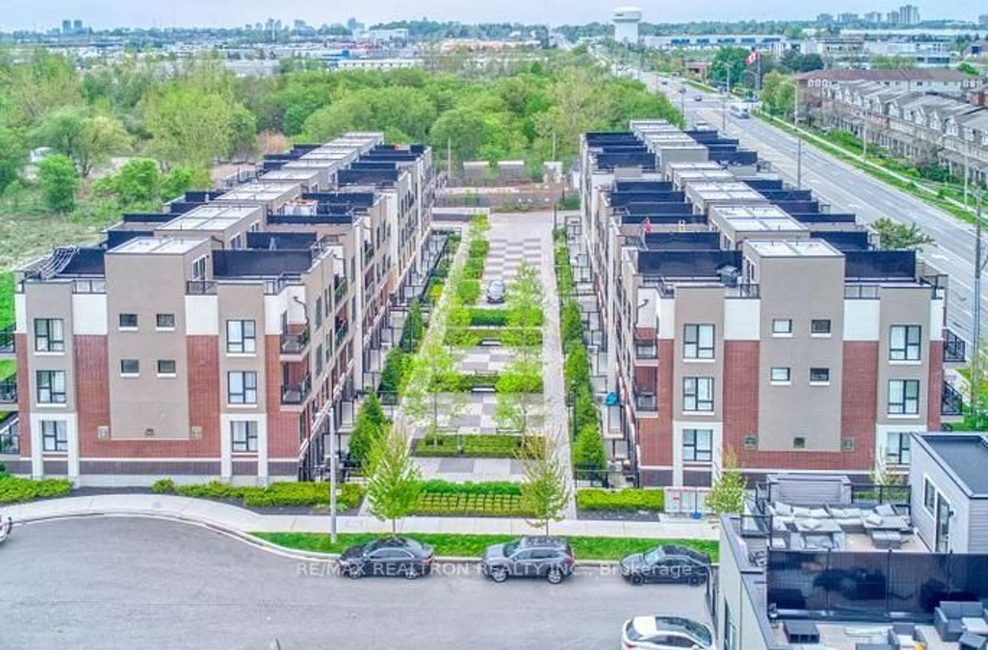 A pic from outside/outdoor area/front of a property/back of a property/a pic from drone, city buildings view from balcony for 510 Kingbird Grve #328, Toronto Ontario M1B 0E4