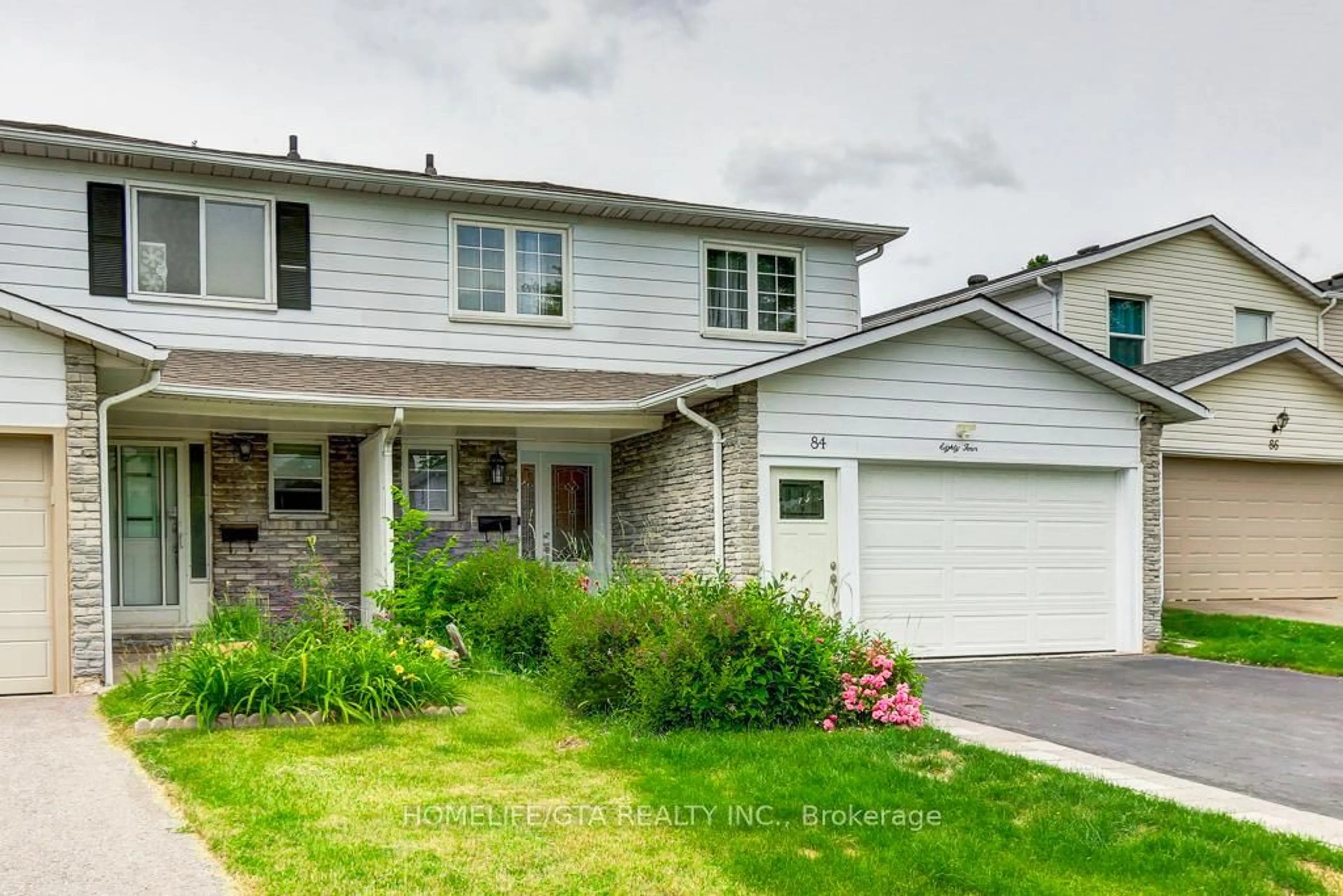 Home with vinyl exterior material, street for 84 Nortonville Dr, Toronto Ontario M1T 2G8