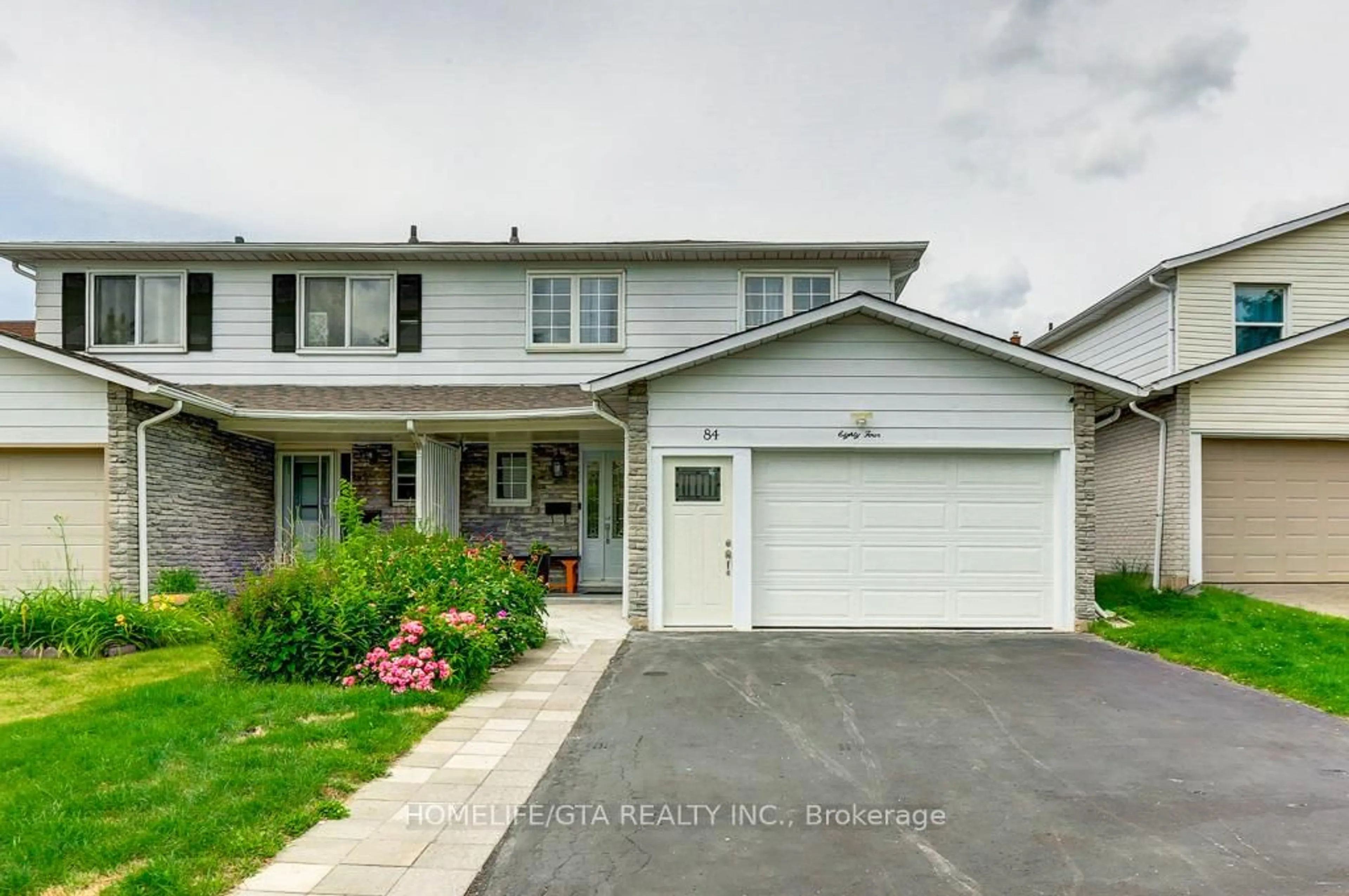 Home with vinyl exterior material, street for 84 Nortonville Dr, Toronto Ontario M1T 2G8