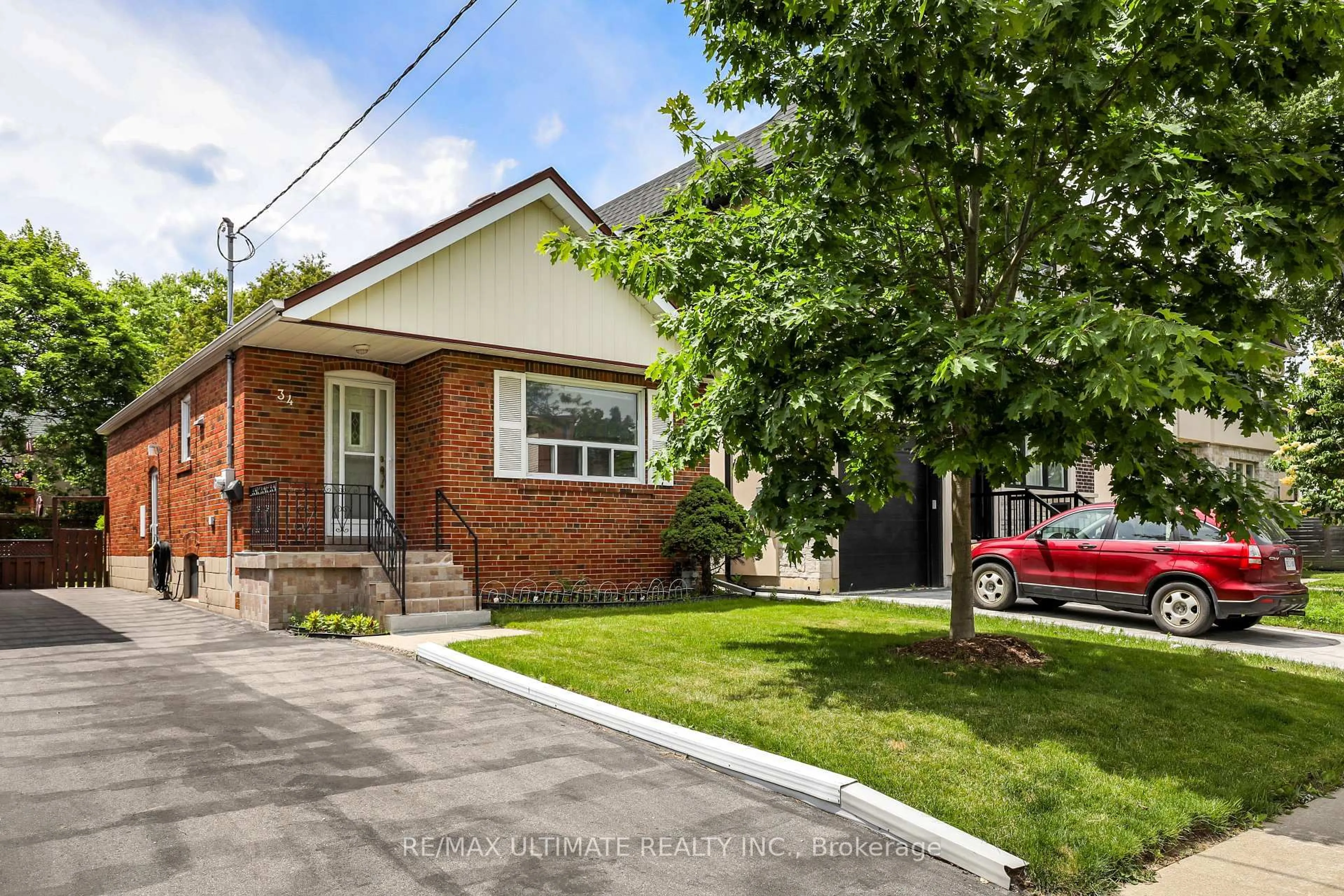 Home with brick exterior material, street for 34 Doris Dr, Toronto Ontario M4B 3C8