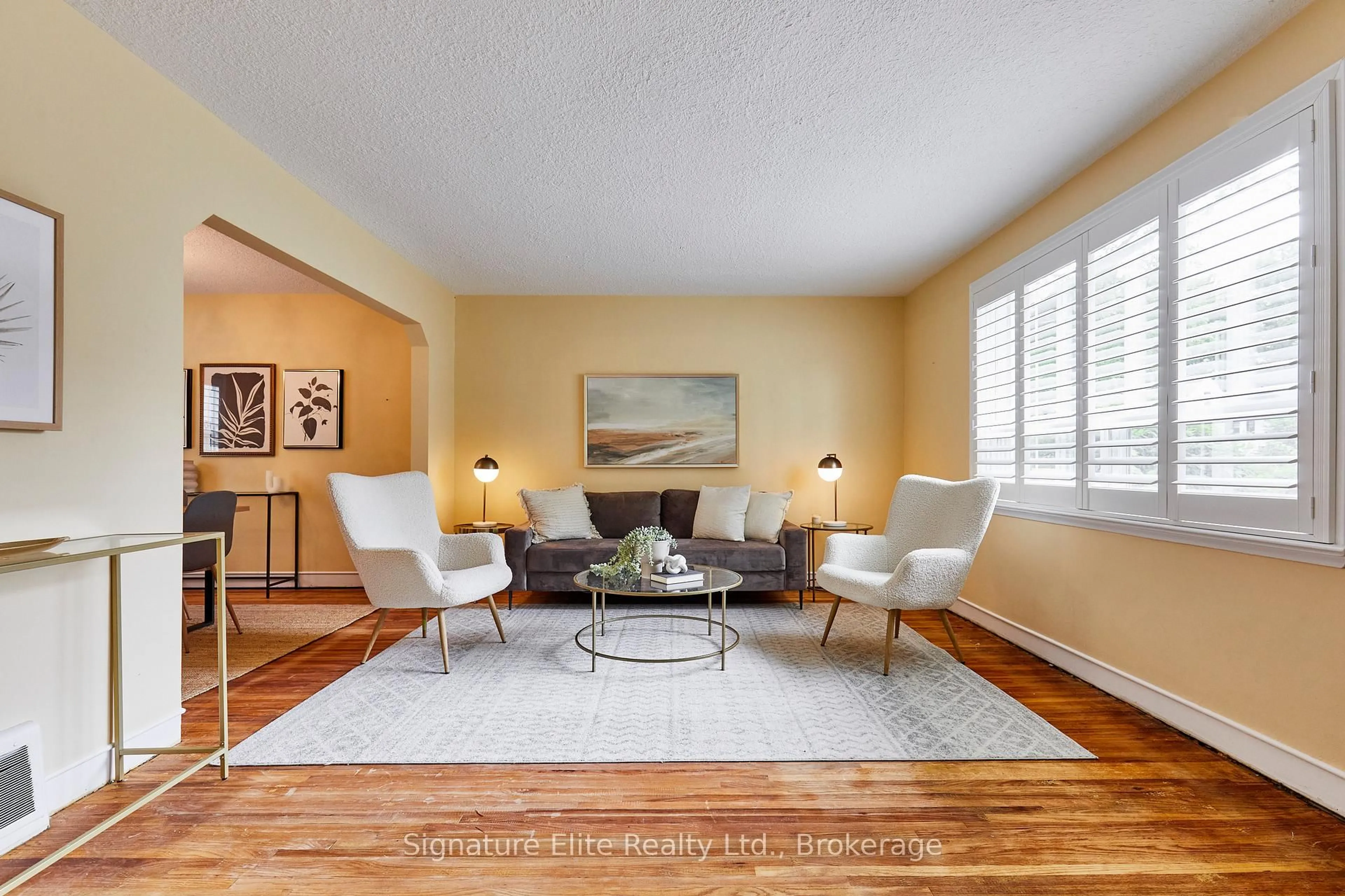 Living room with furniture, wood/laminate floor for 45 Heathfield Dr, Toronto Ontario M1M 3A9
