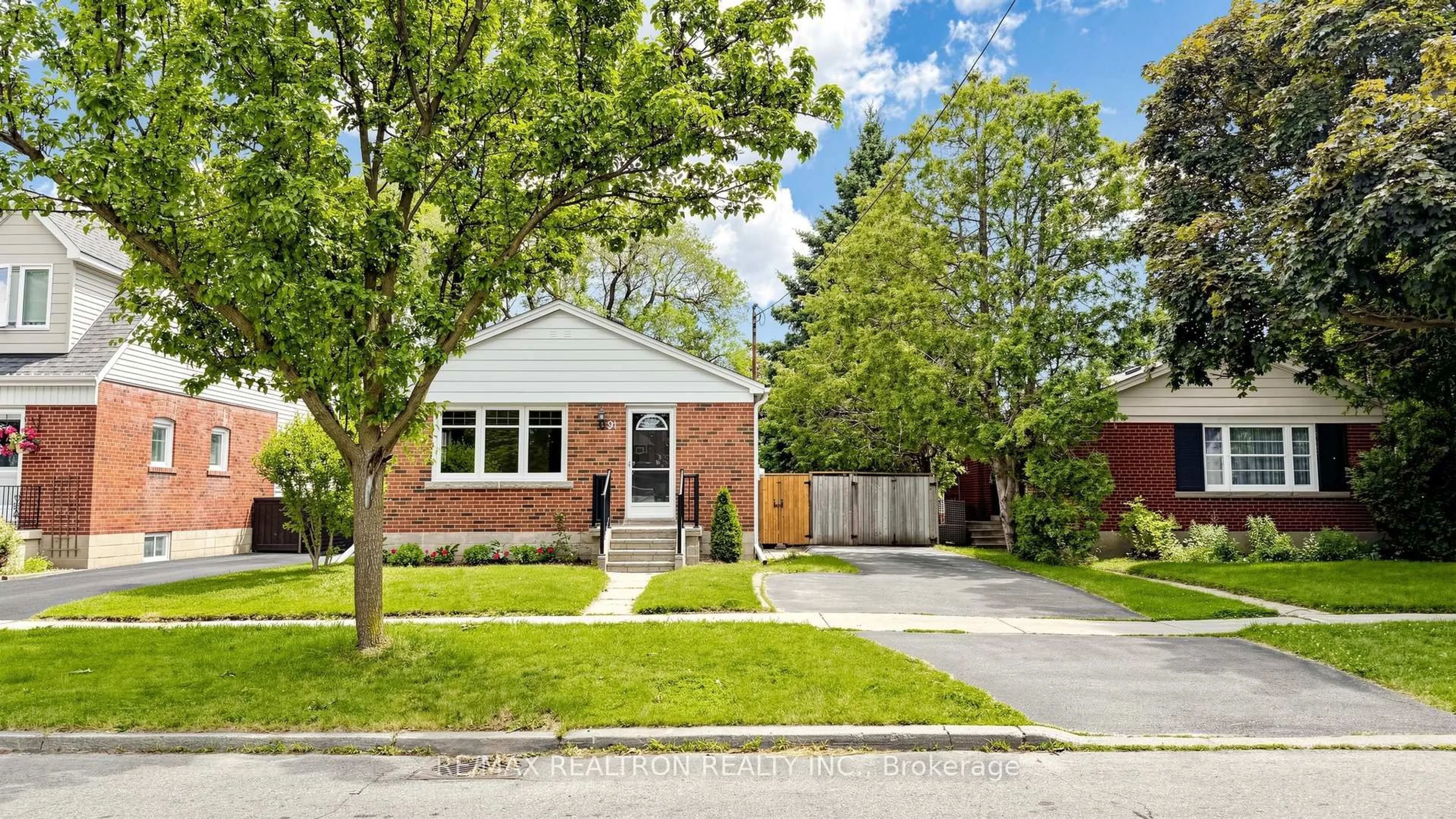 Home with brick exterior material, street for 91 Vauxhall Dr, Toronto Ontario M1P 1R1