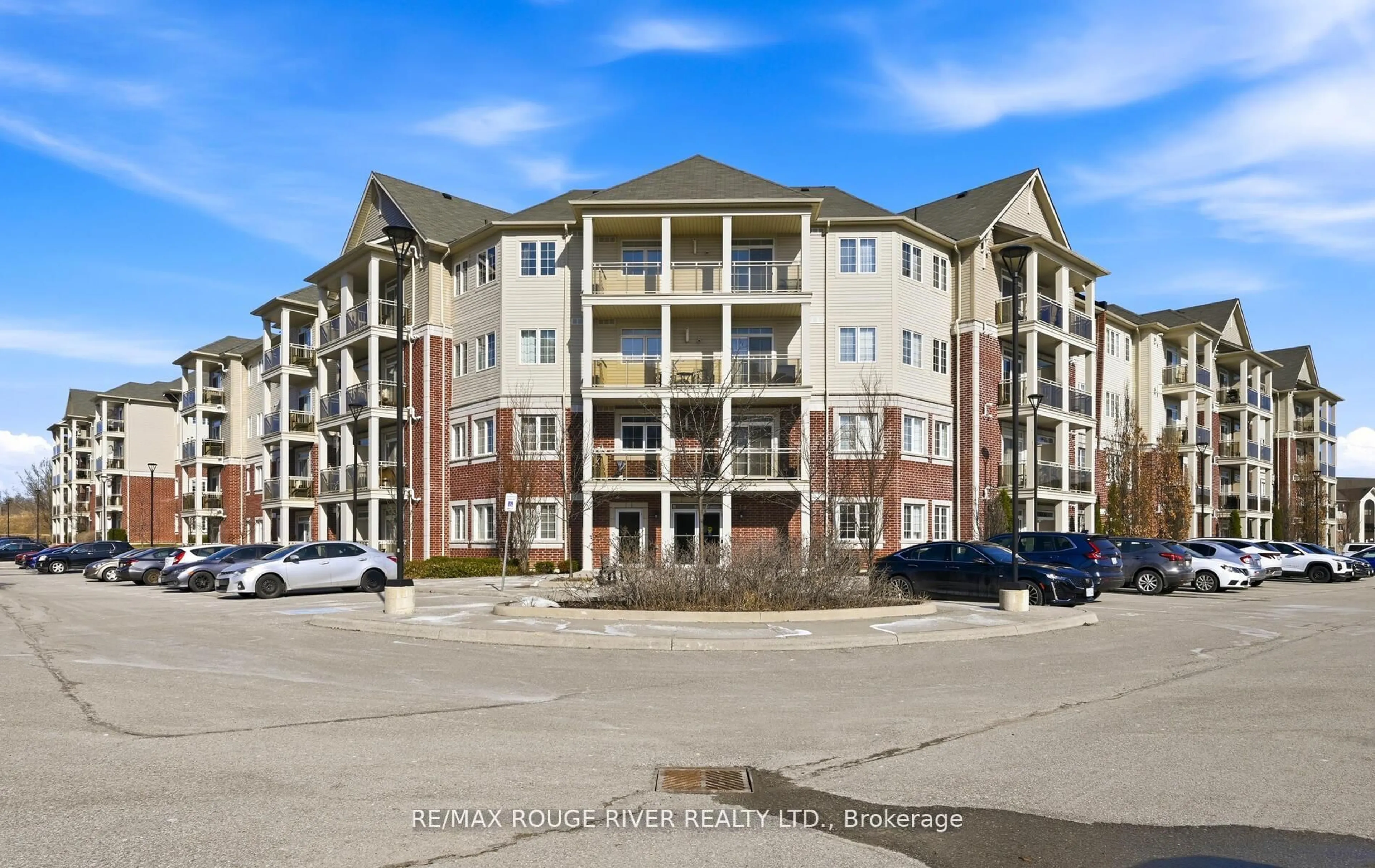 A pic from outside/outdoor area/front of a property/back of a property/a pic from drone, unknown for 84 Aspen Springs Dr #106, Clarington Ontario L1C 0V3