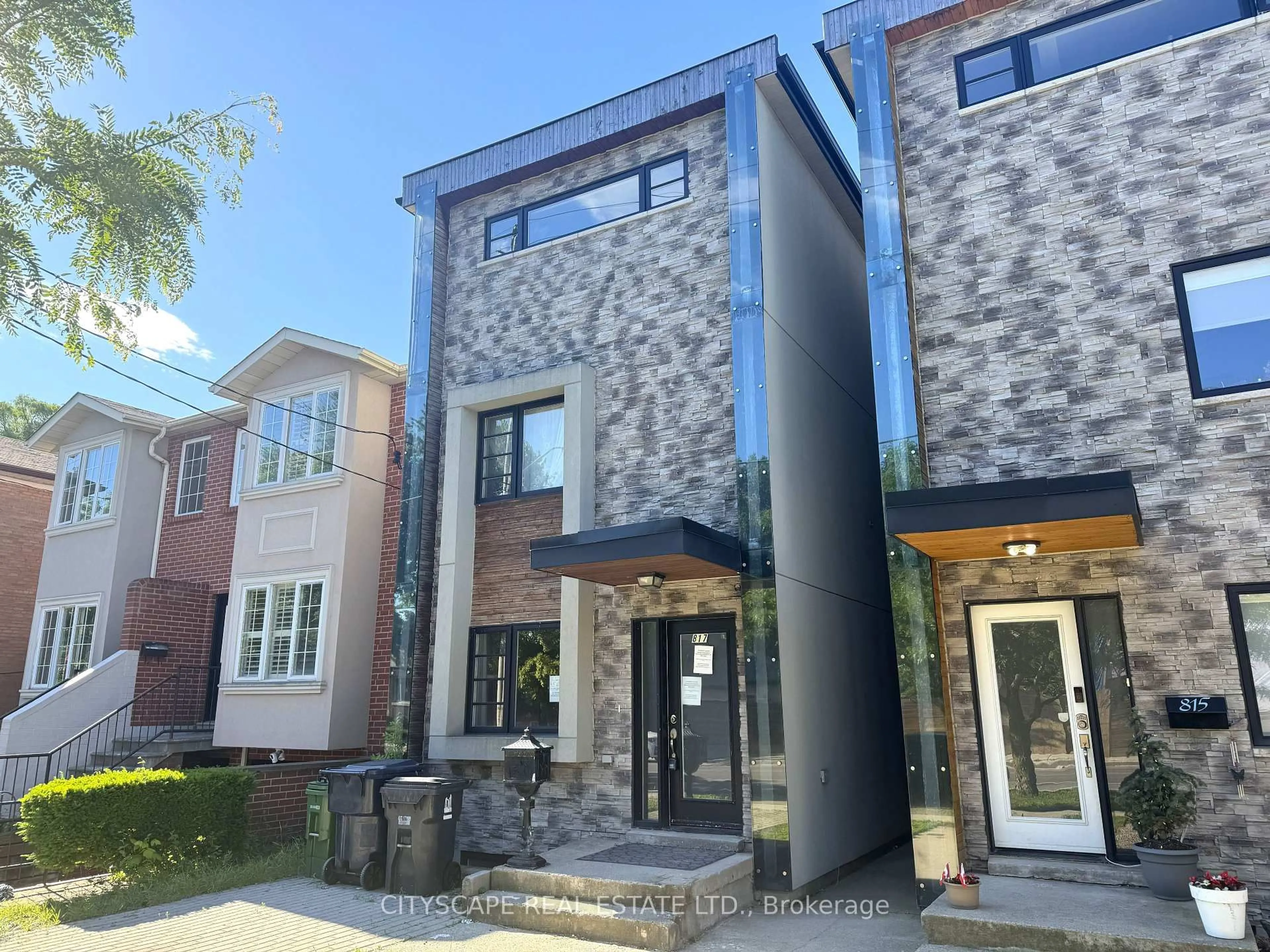 Home with brick exterior material, street for 817 Cosburn Ave, Toronto Ontario M4C 2V9