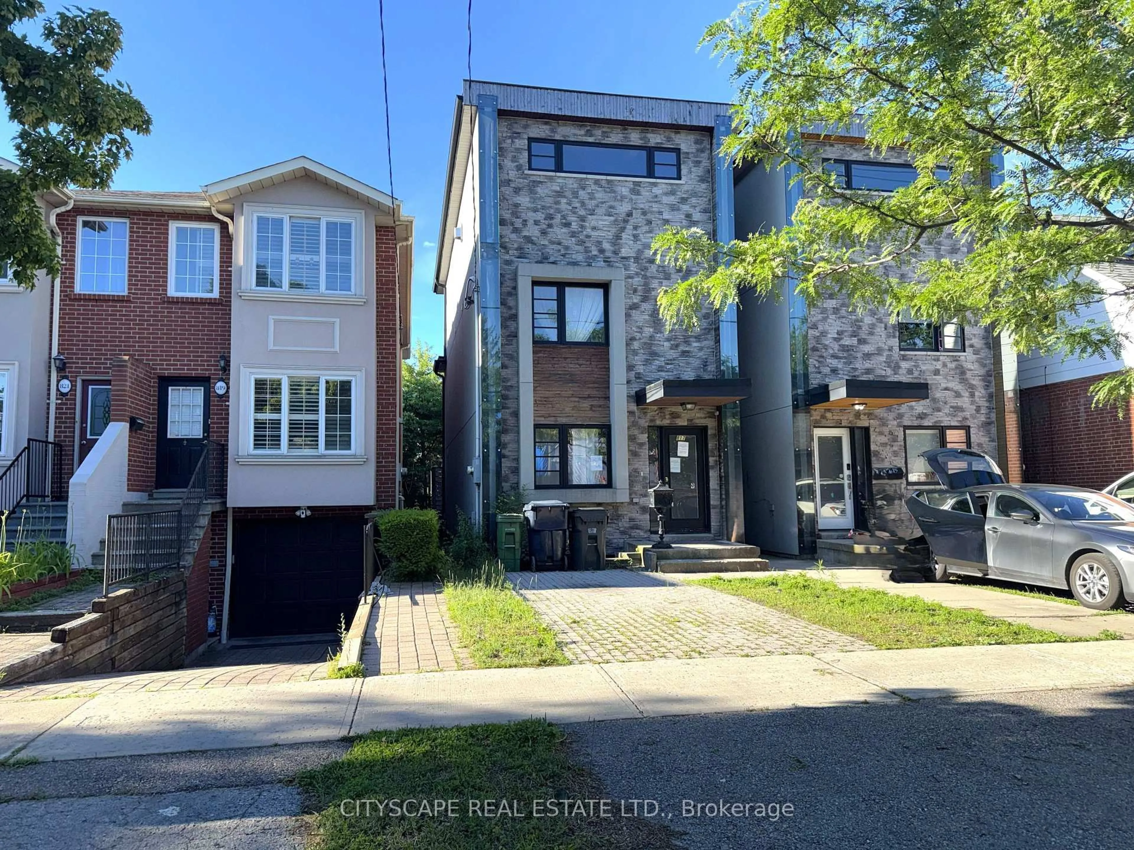 Home with brick exterior material, street for 817 Cosburn Ave, Toronto Ontario M4C 2V9