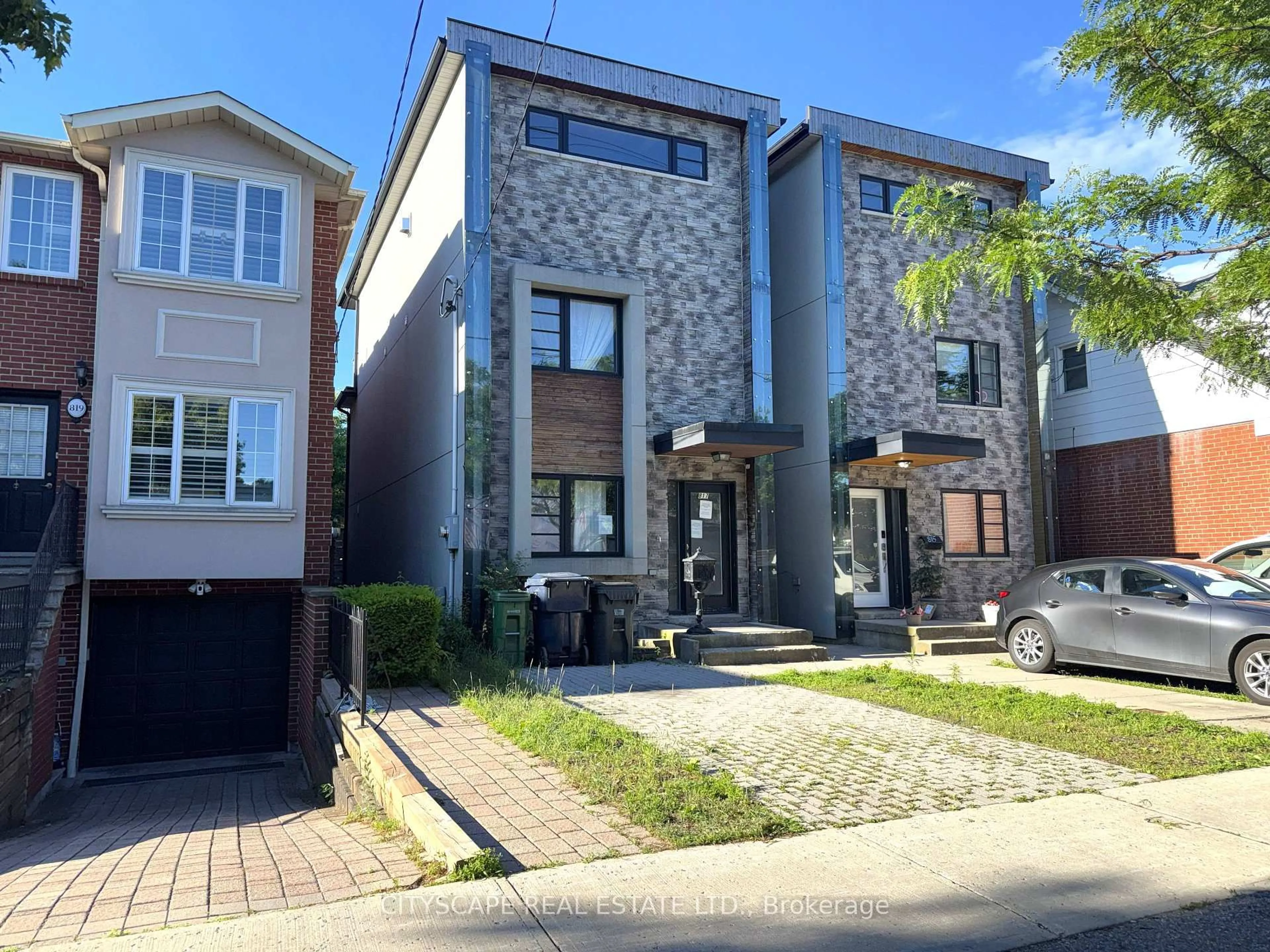 Home with brick exterior material, street for 817 Cosburn Ave, Toronto Ontario M4C 2V9