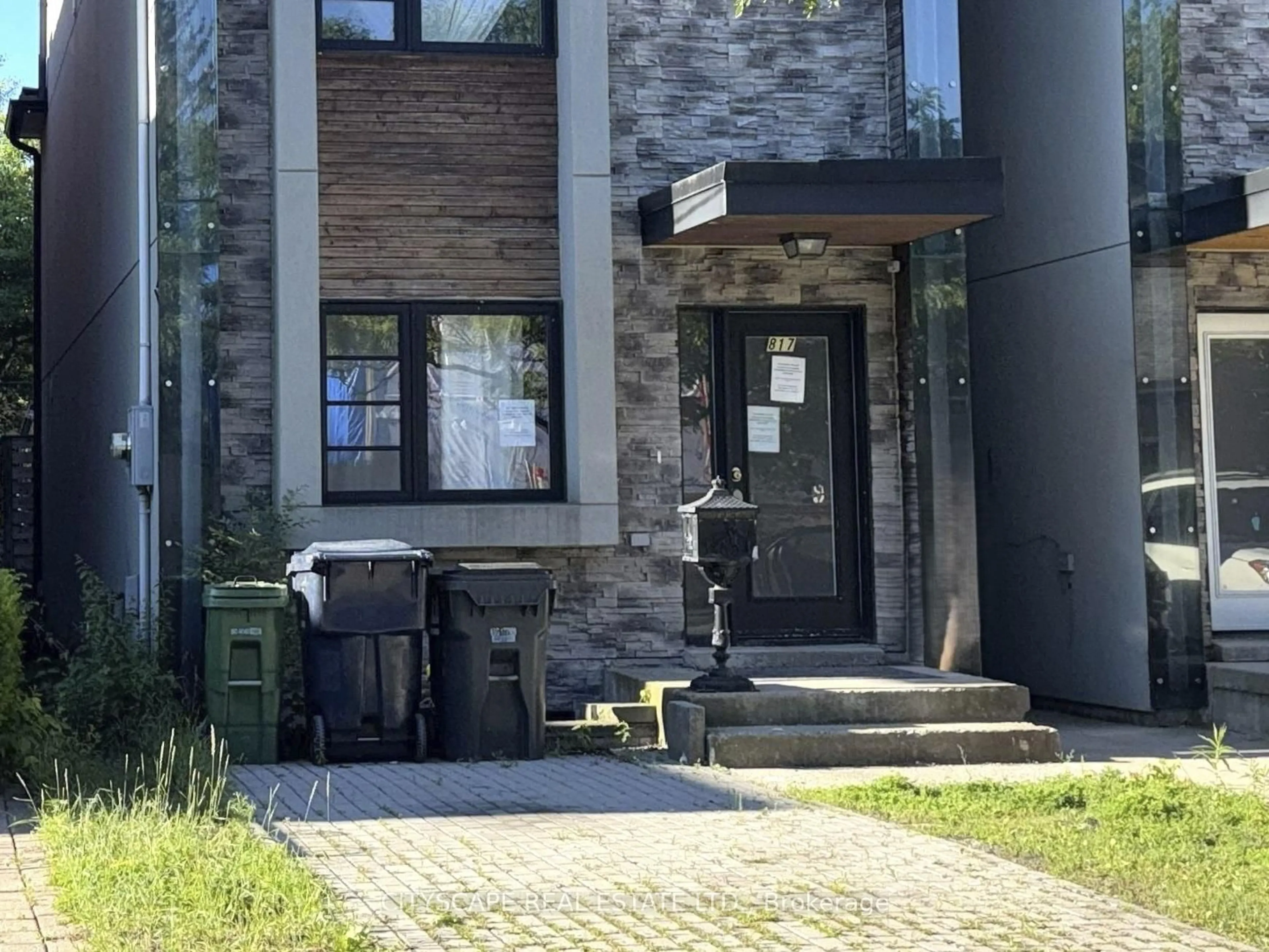Home with brick exterior material, street for 817 Cosburn Ave, Toronto Ontario M4C 2V9