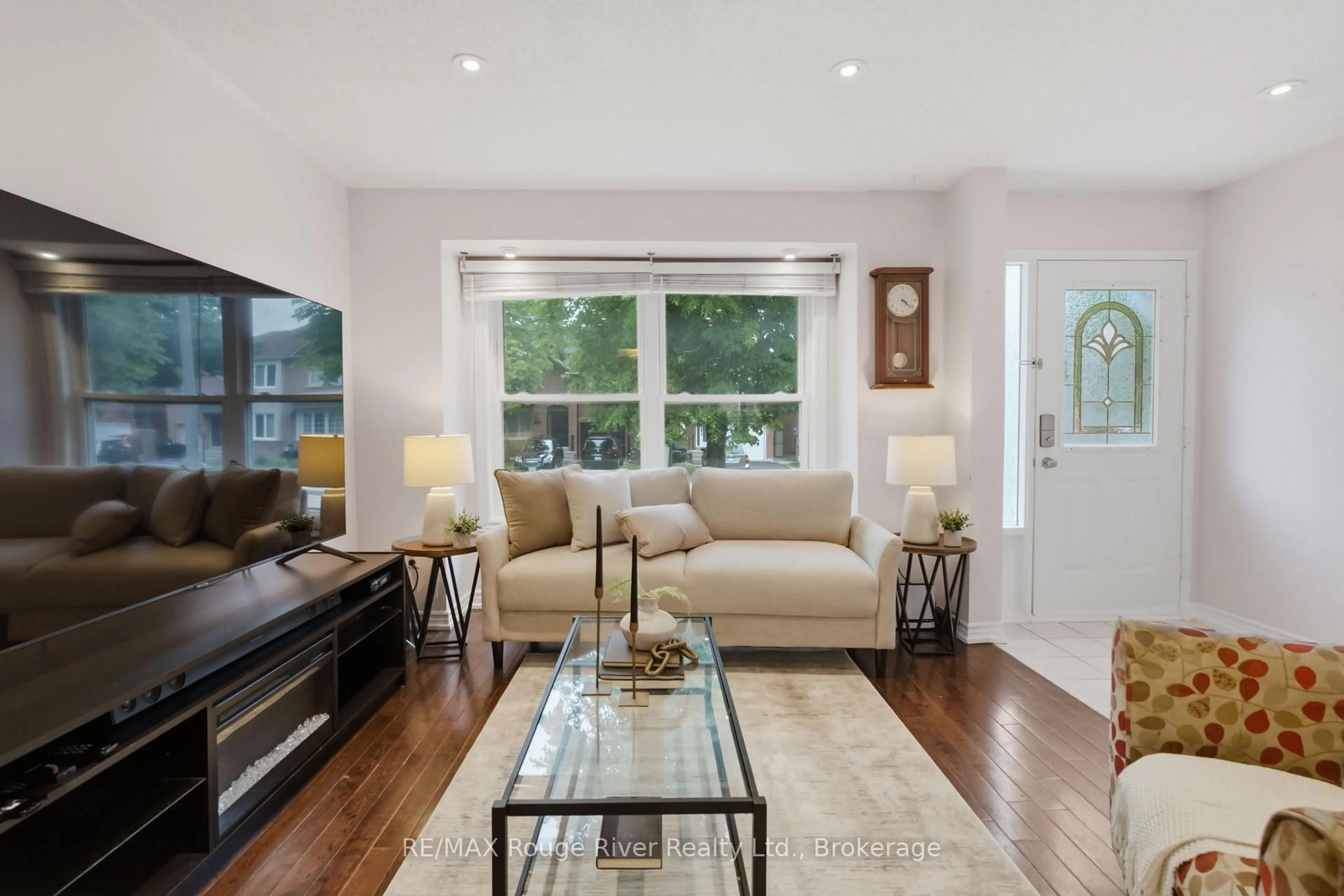 Living room with furniture, wood/laminate floor for 1546 Village St, Pickering Ontario L1V 4V9