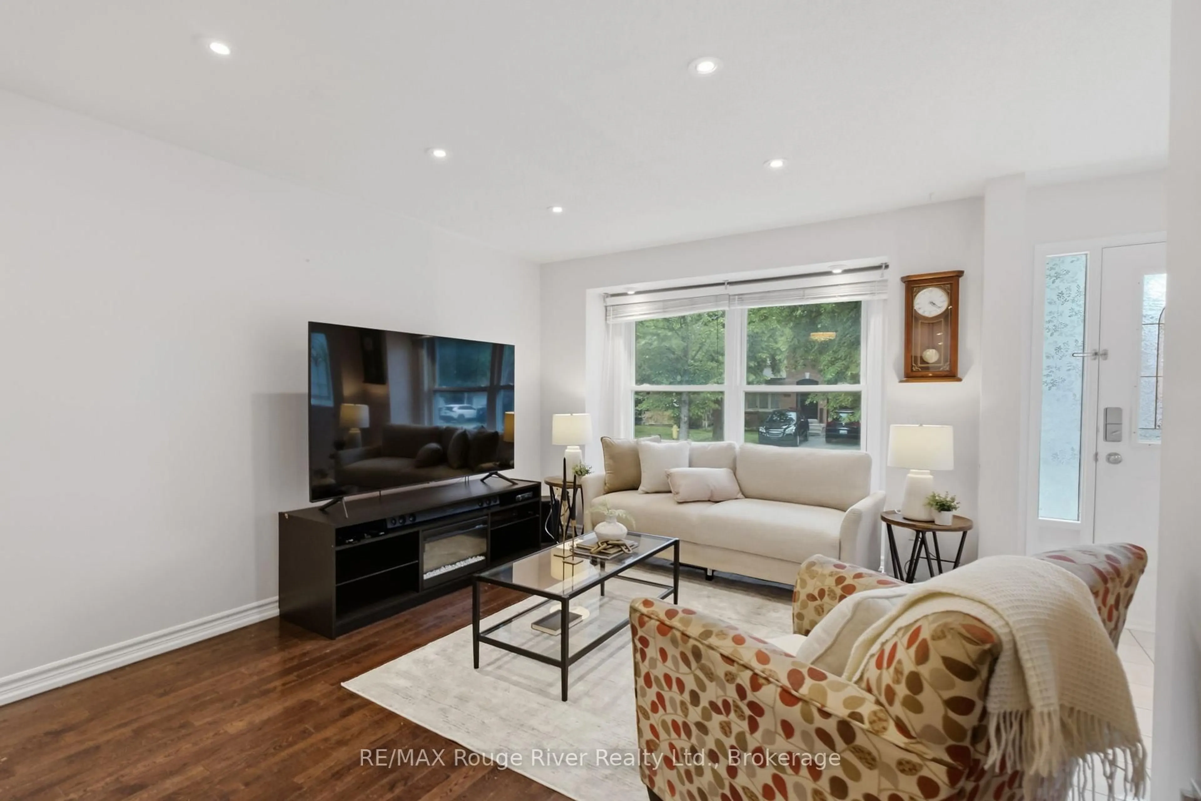 Living room with furniture, wood/laminate floor for 1546 Village St, Pickering Ontario L1V 4V9