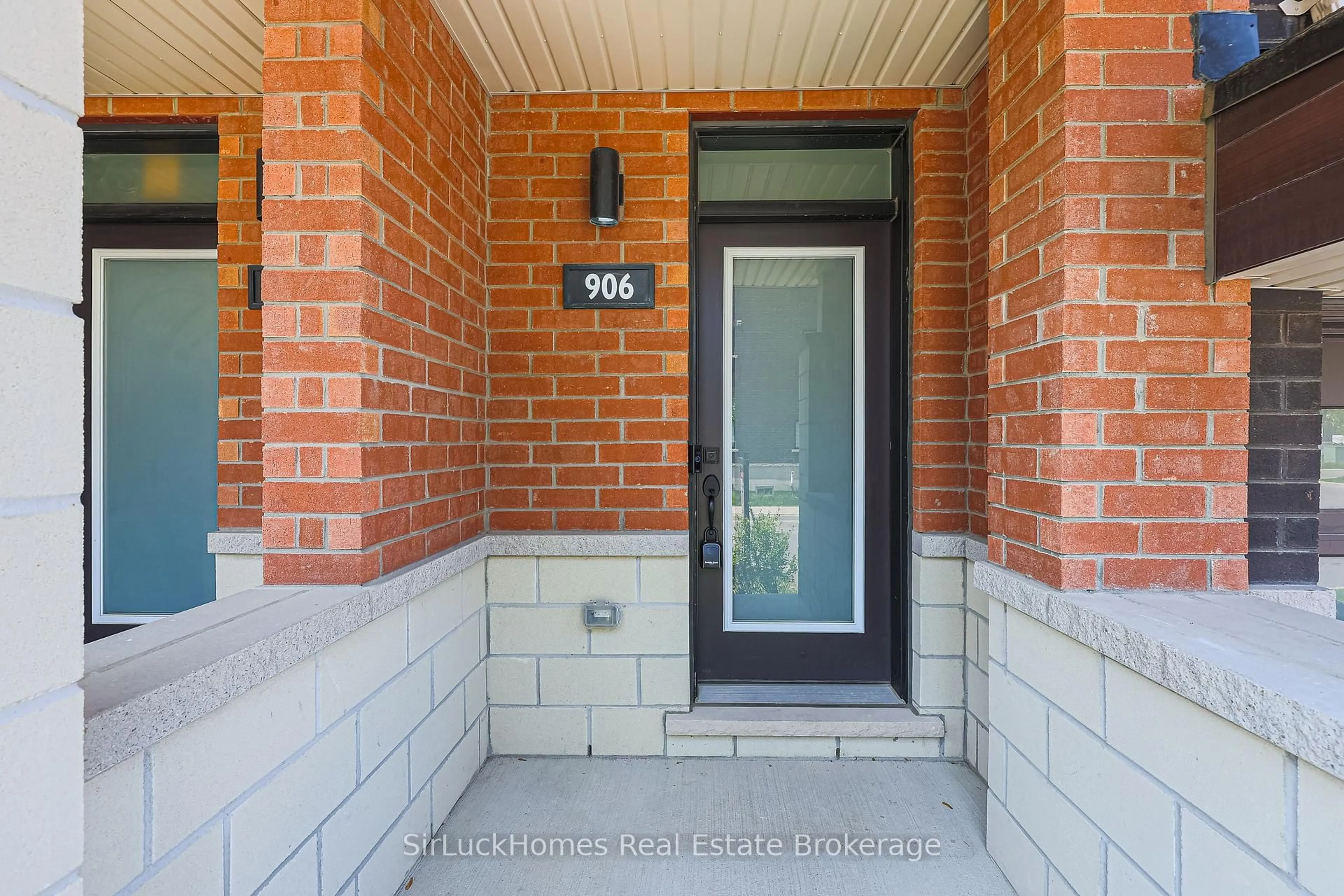 Home with brick exterior material, street for 906 Kicking Horse Path, Oshawa Ontario L1J 0B4