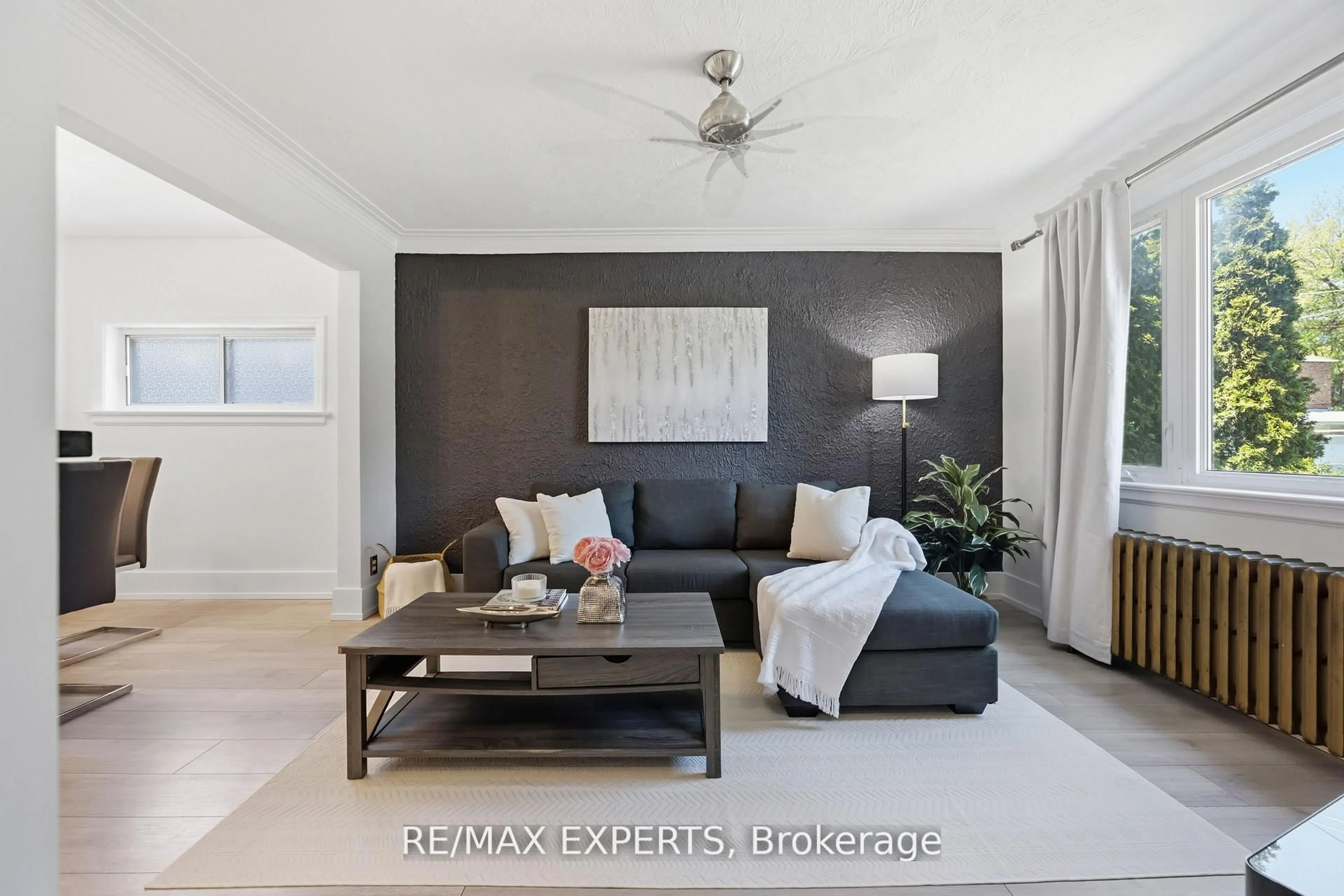Living room with furniture, unknown for 221 Clonmore Dr, Toronto Ontario M1N 1Y4