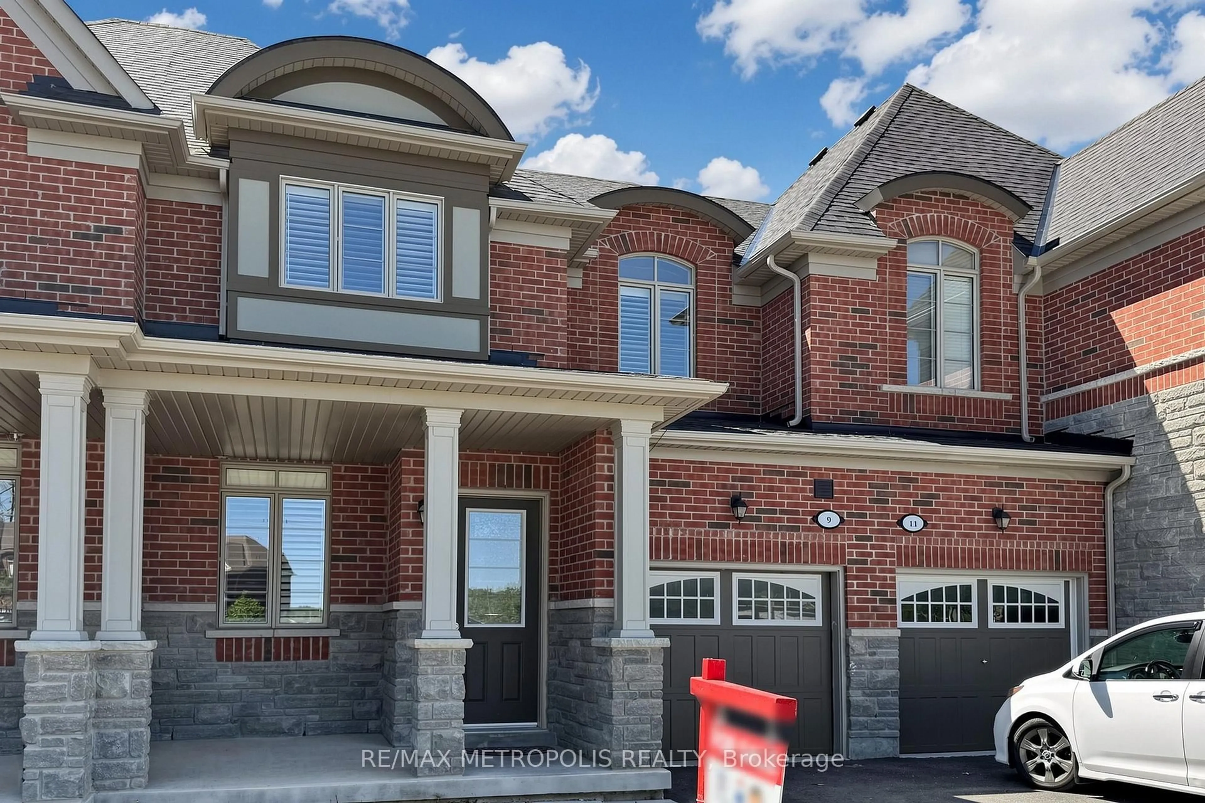 Home with brick exterior material, street for 9 Caton Lane, Ajax Ontario L1T 0P8