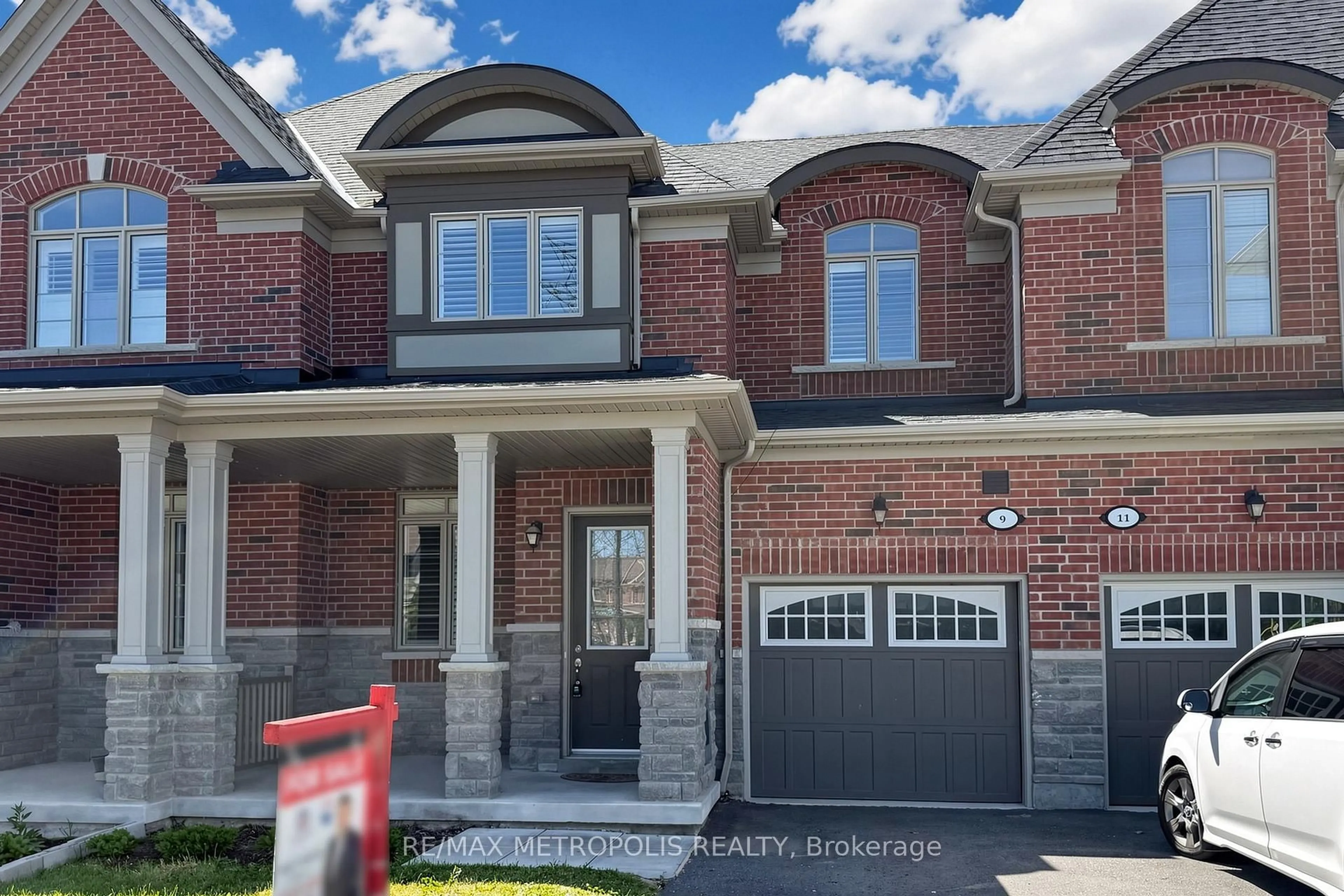 Home with brick exterior material, street for 9 Caton Lane, Ajax Ontario L1T 0P8