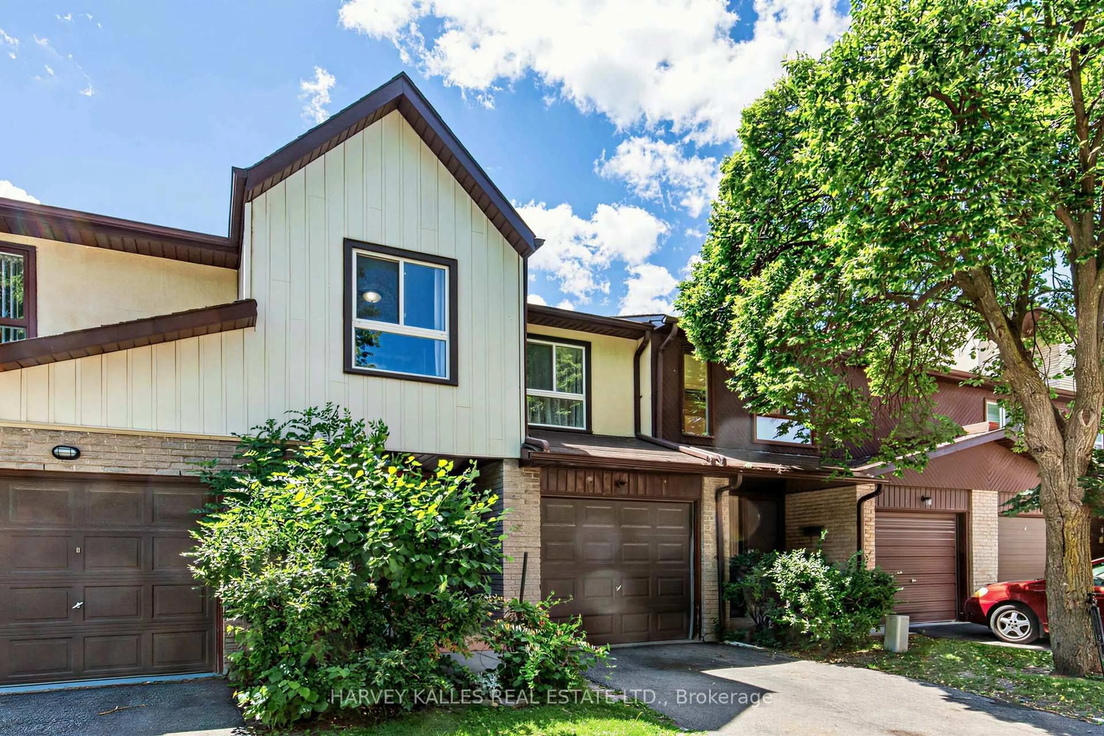 Home with brick exterior material, street for 1180 Sandhurst Circ #2, Toronto Ontario M1V 1T8