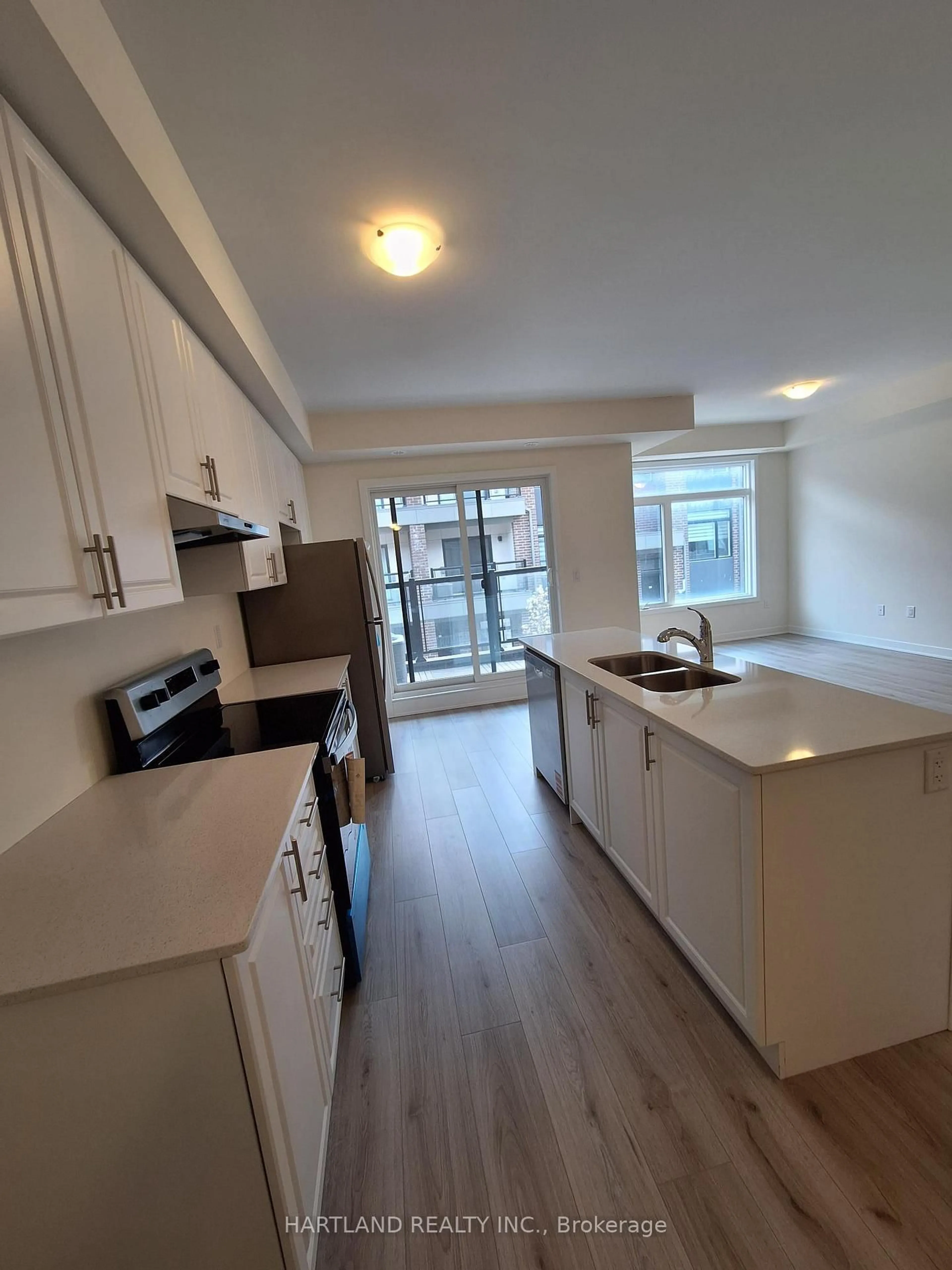 Open concept kitchen, wood/laminate floor for 1695 Dersan St #1409, Pickering Ontario L1X 0S9