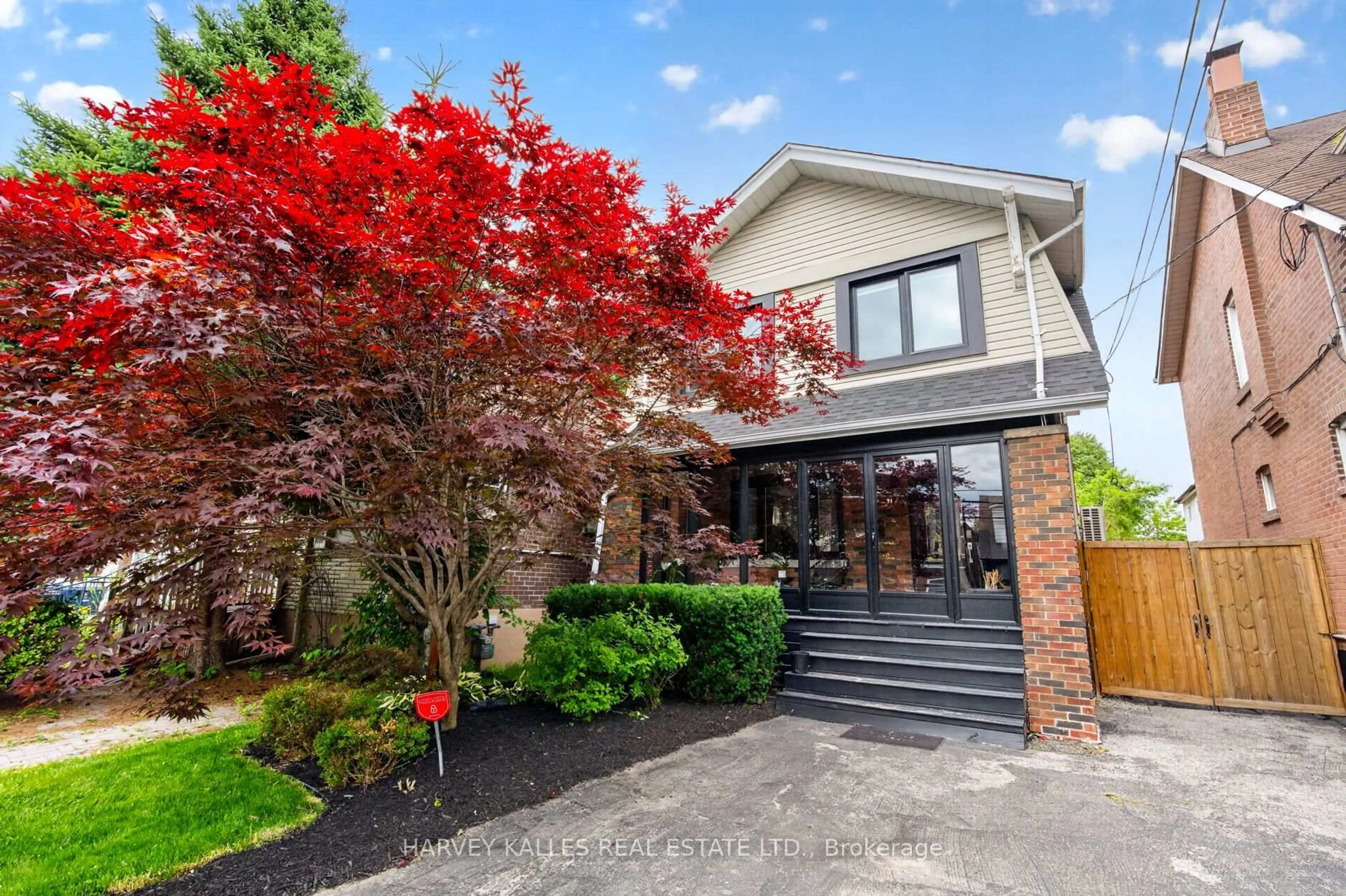 Home with brick exterior material, street for 117 Dawes Rd, Toronto Ontario M4C 5B8