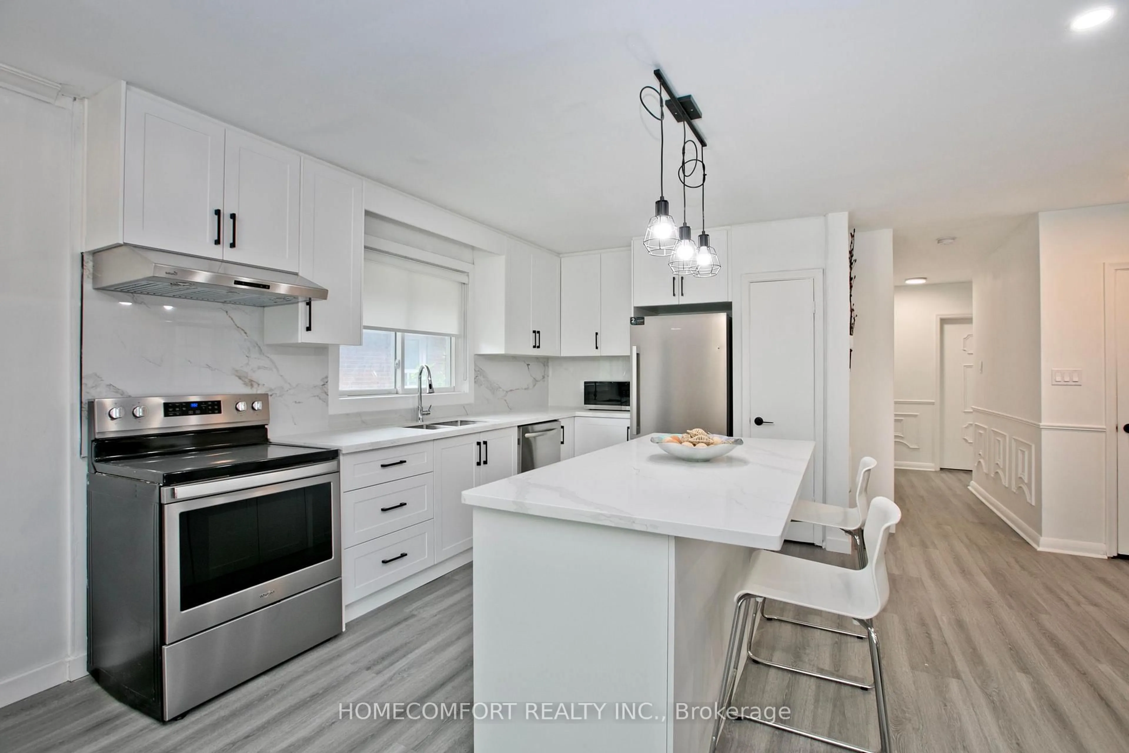 Open concept kitchen, ceramic/tile floor for 19 Beacham Cres, Toronto Ontario M1T 1M9